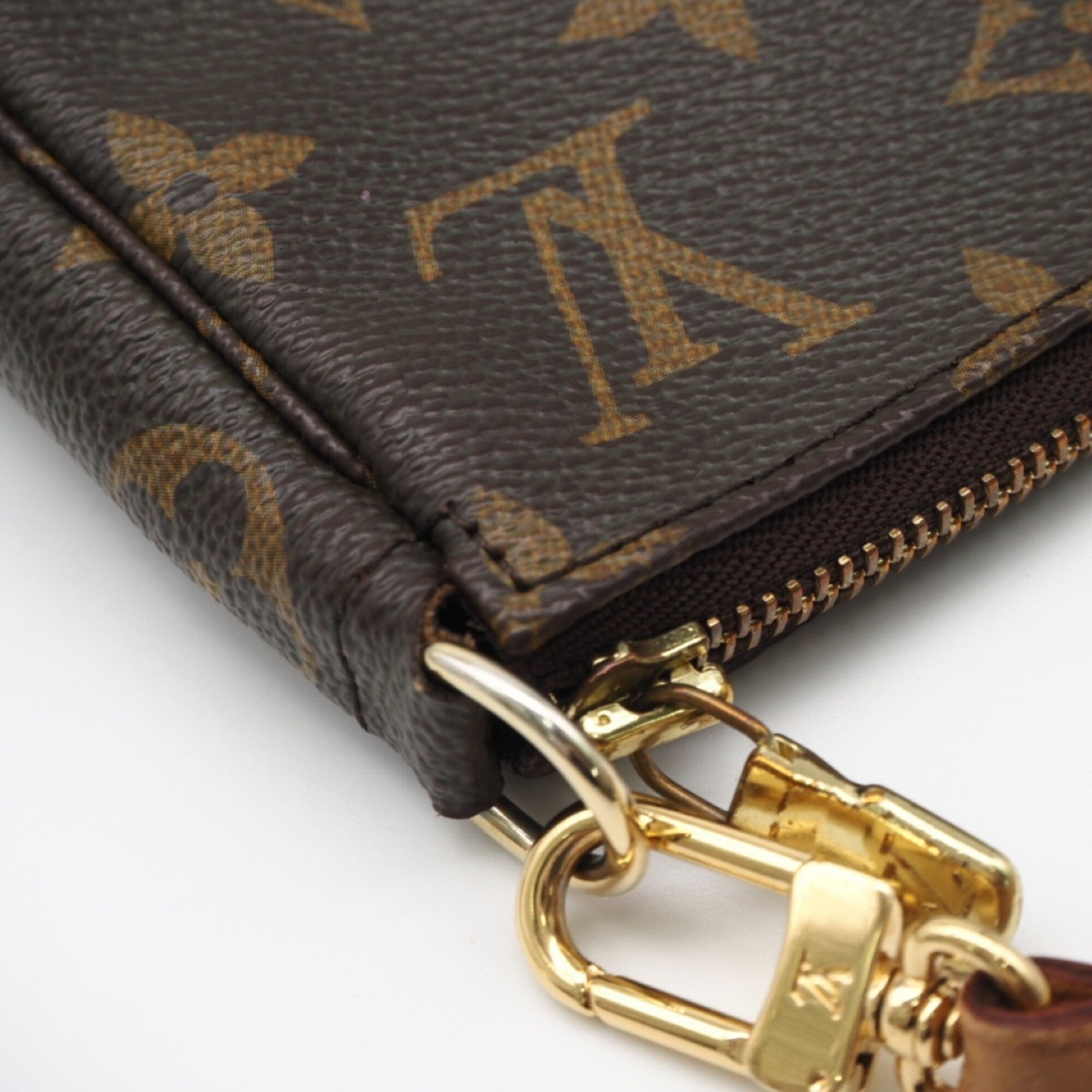 Louis Vuitton Monogram Brown Coated Canvas Leather Pouch (Pre-Owned)