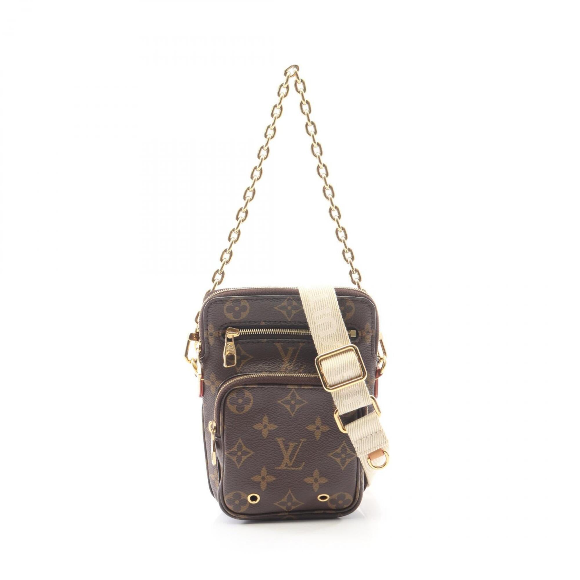 Louis Vuitton Brown Coated Canvas Pvc Leather Handbag (Pre-Owned)