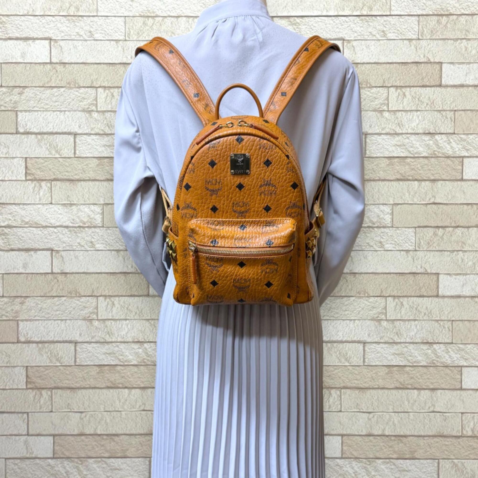 Mcm Brown Red Brown Leather Pvc Coated Canvas Backpack (Pre-Owned)