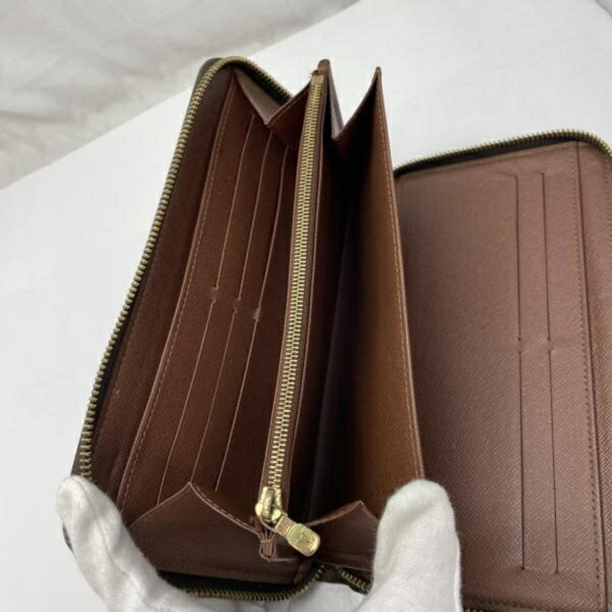 Louis Vuitton Brown Monogram Long Wallet (Bi-Fold) (Pre-Owned)