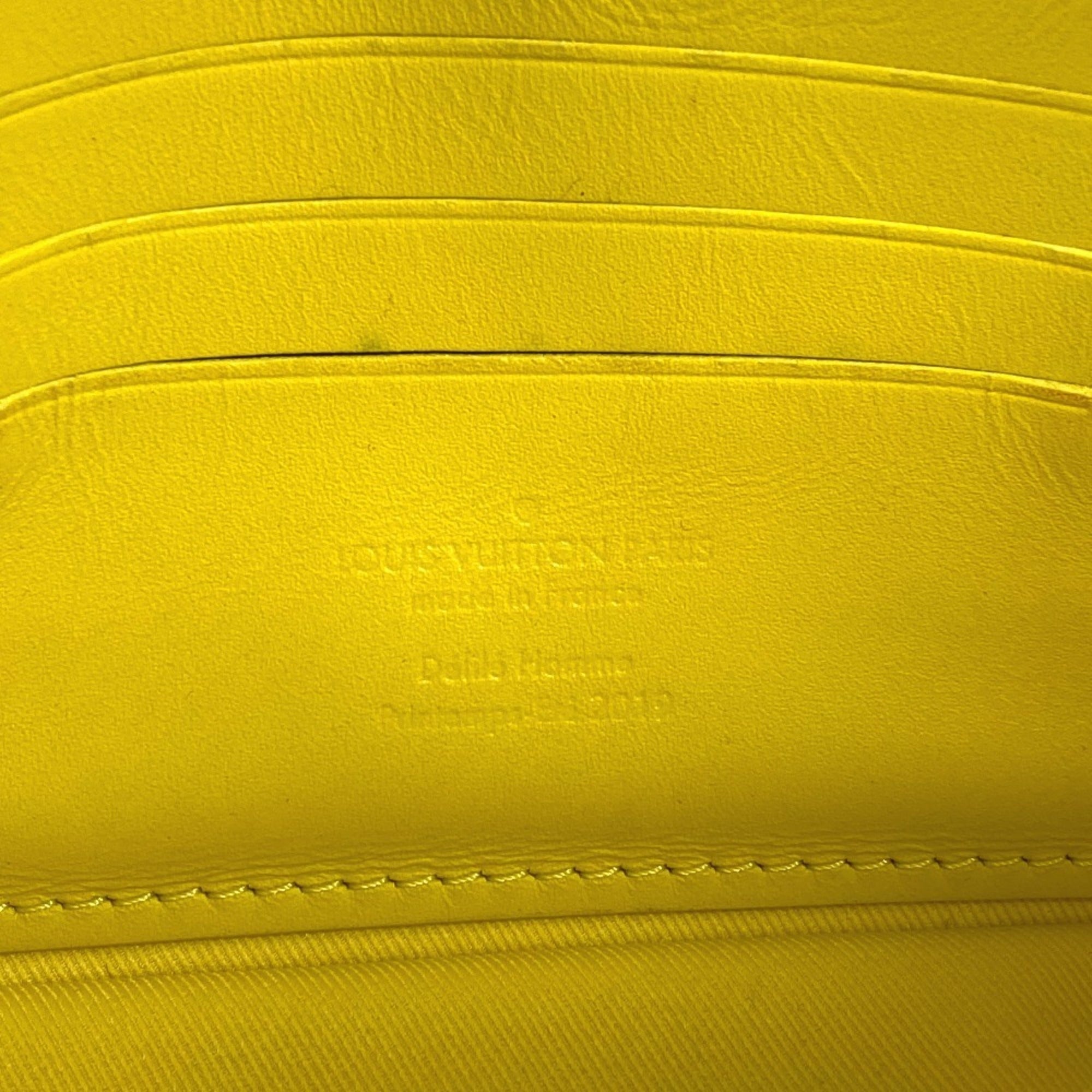 Louis Vuitton Yellow Leather Clutch Bag (Pre-Owned)