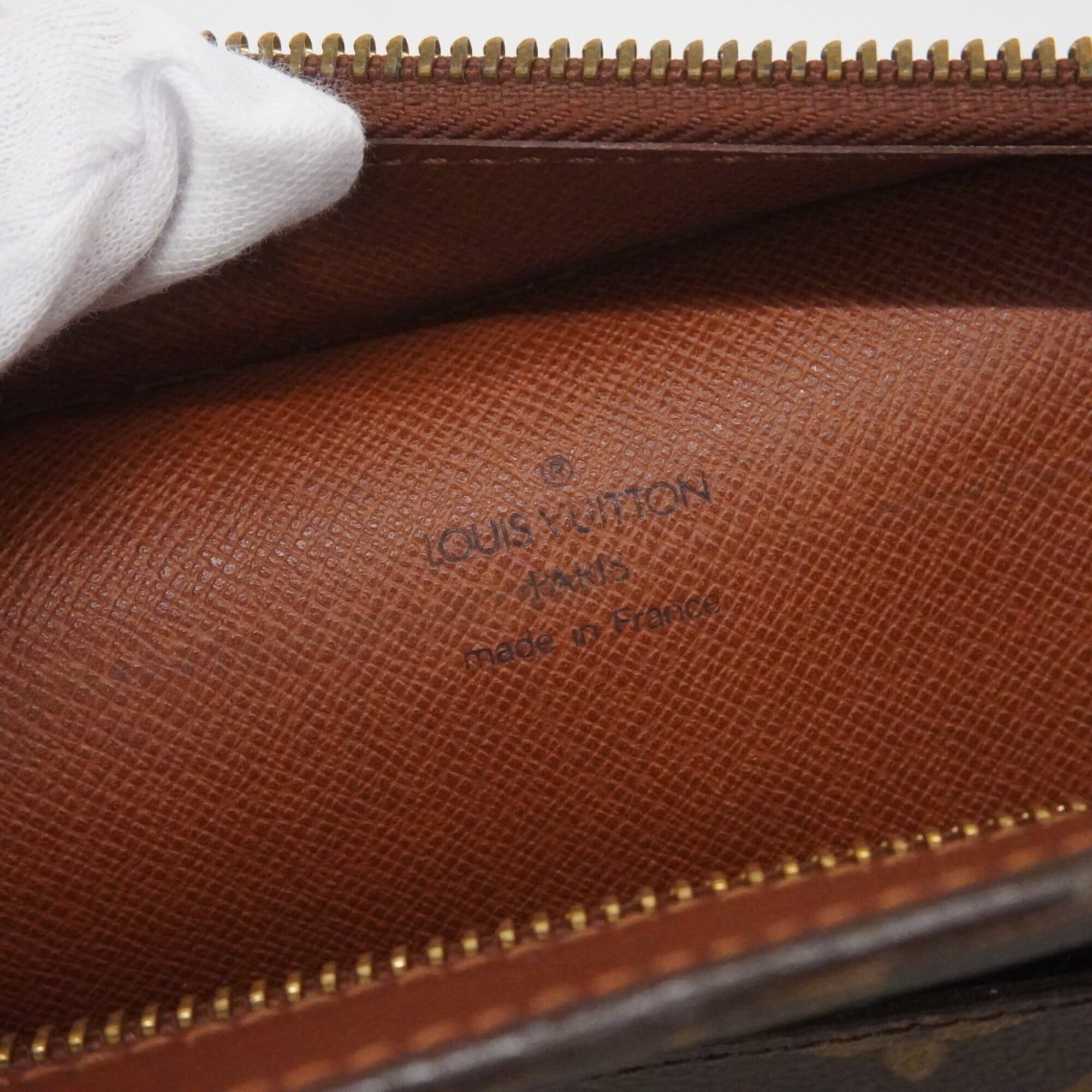 Louis Vuitton Brown Clutch Bag (Pre-Owned)