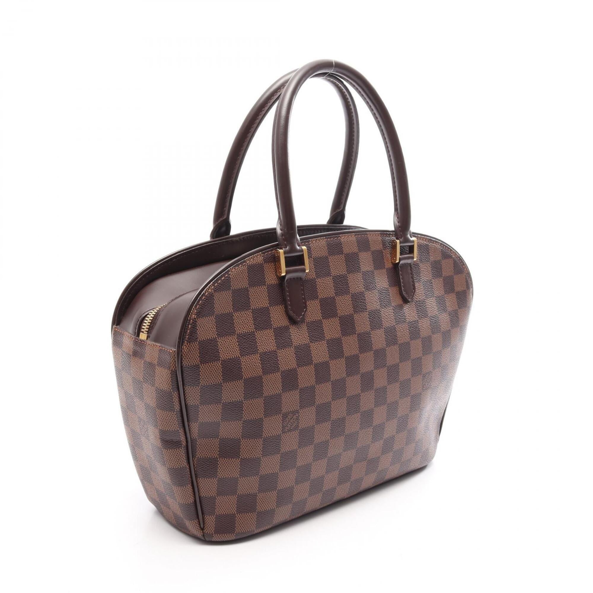 Louis Vuitton Brown Coated Canvas Pvc Leather Handbag (Pre-Owned)