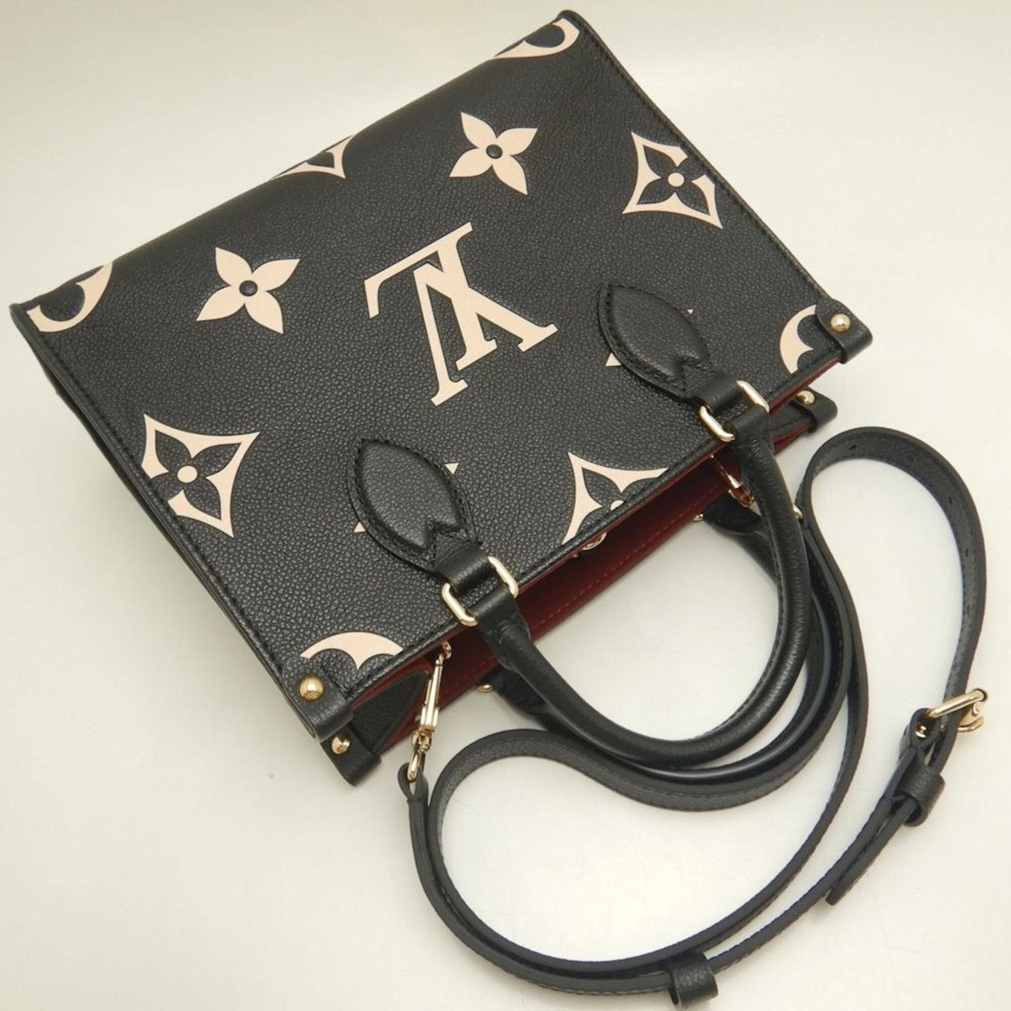 Louis Vuitton Beige Black Monogram Handbag (Pre-Owned)