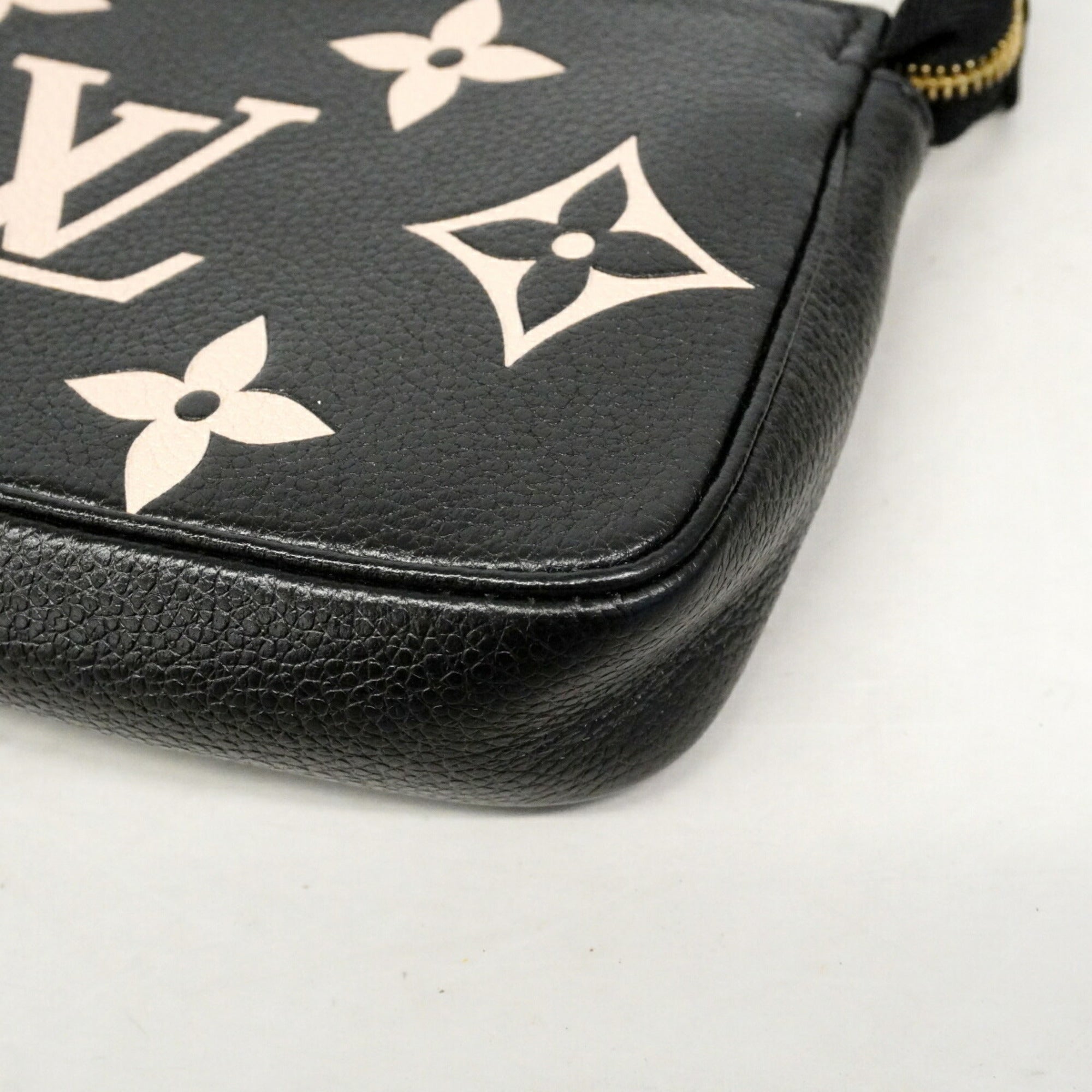 Louis Vuitton Cream Noir Pouch (Pre-Owned)