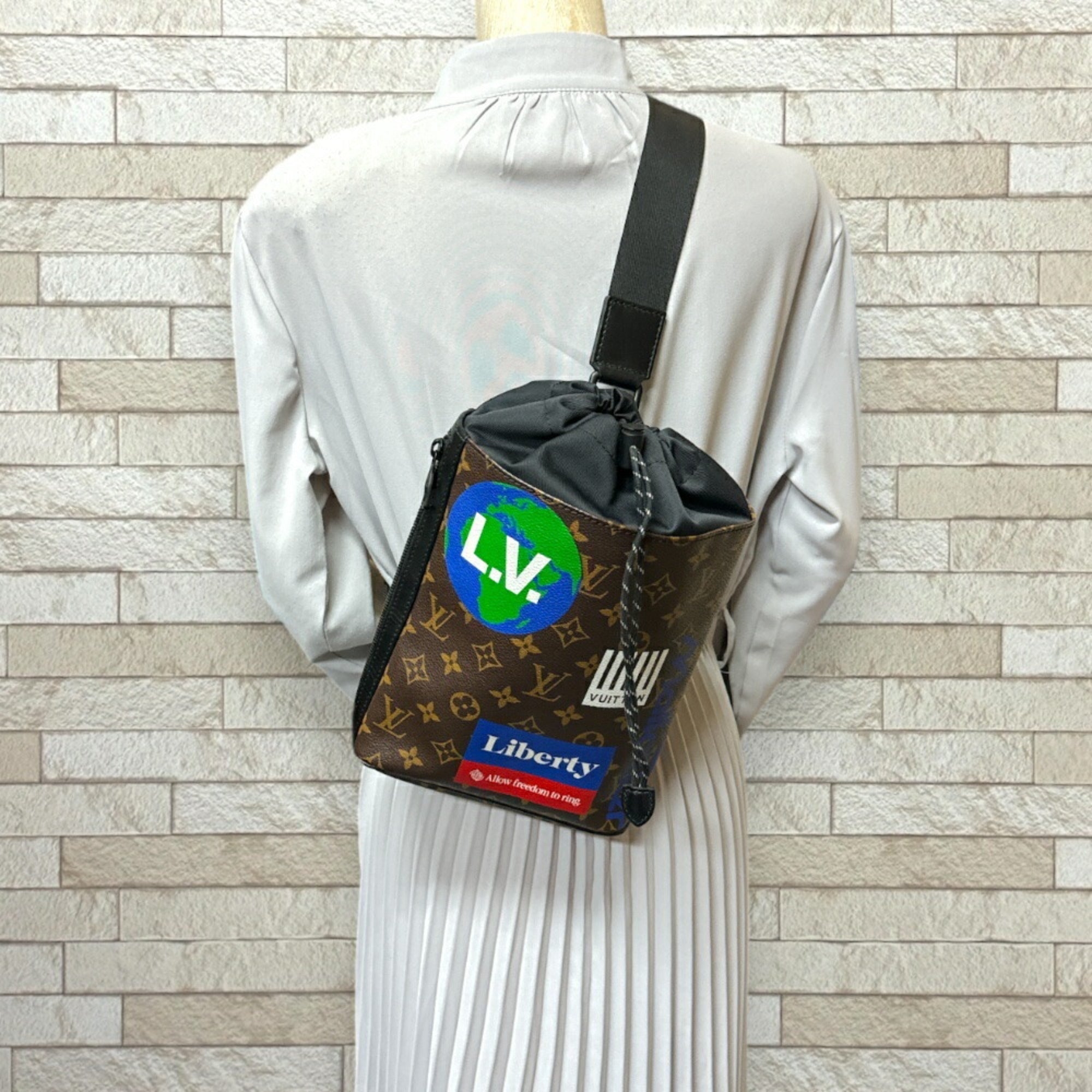 Louis Vuitton Brown Monogram Canvas Sling Bag (Pre-Owned)