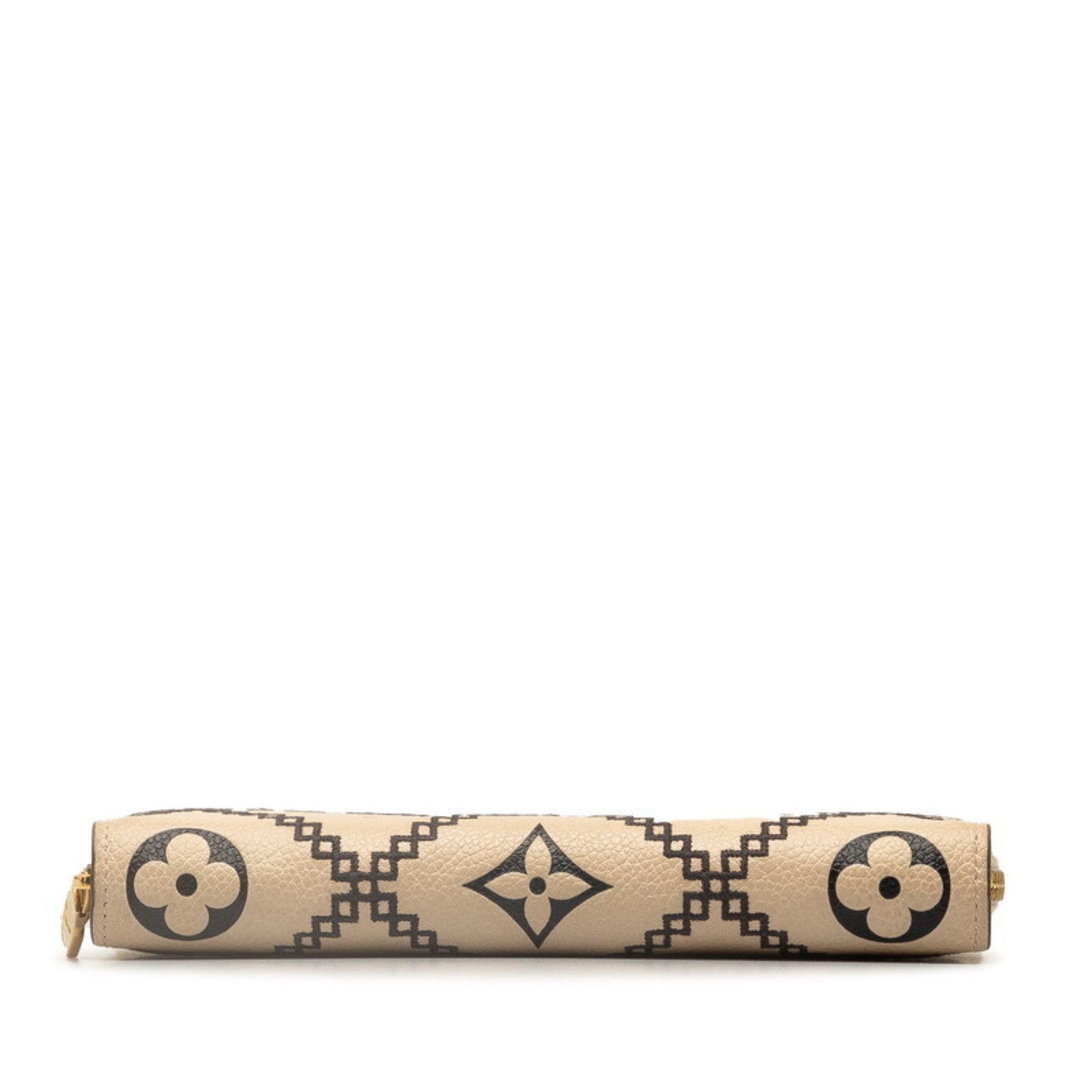 Louis Vuitton Monogram Empreinte Beige Monogram Leather Wallet (Bi-Fold) (Pre-Owned)