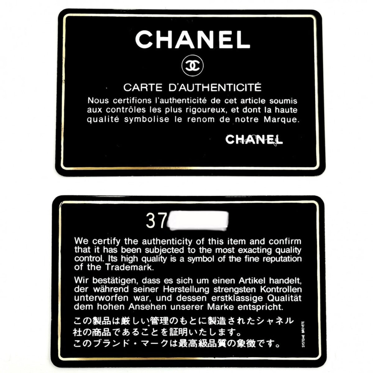 Chanel Black Grained Calfskin Handbag (Pre-Owned)