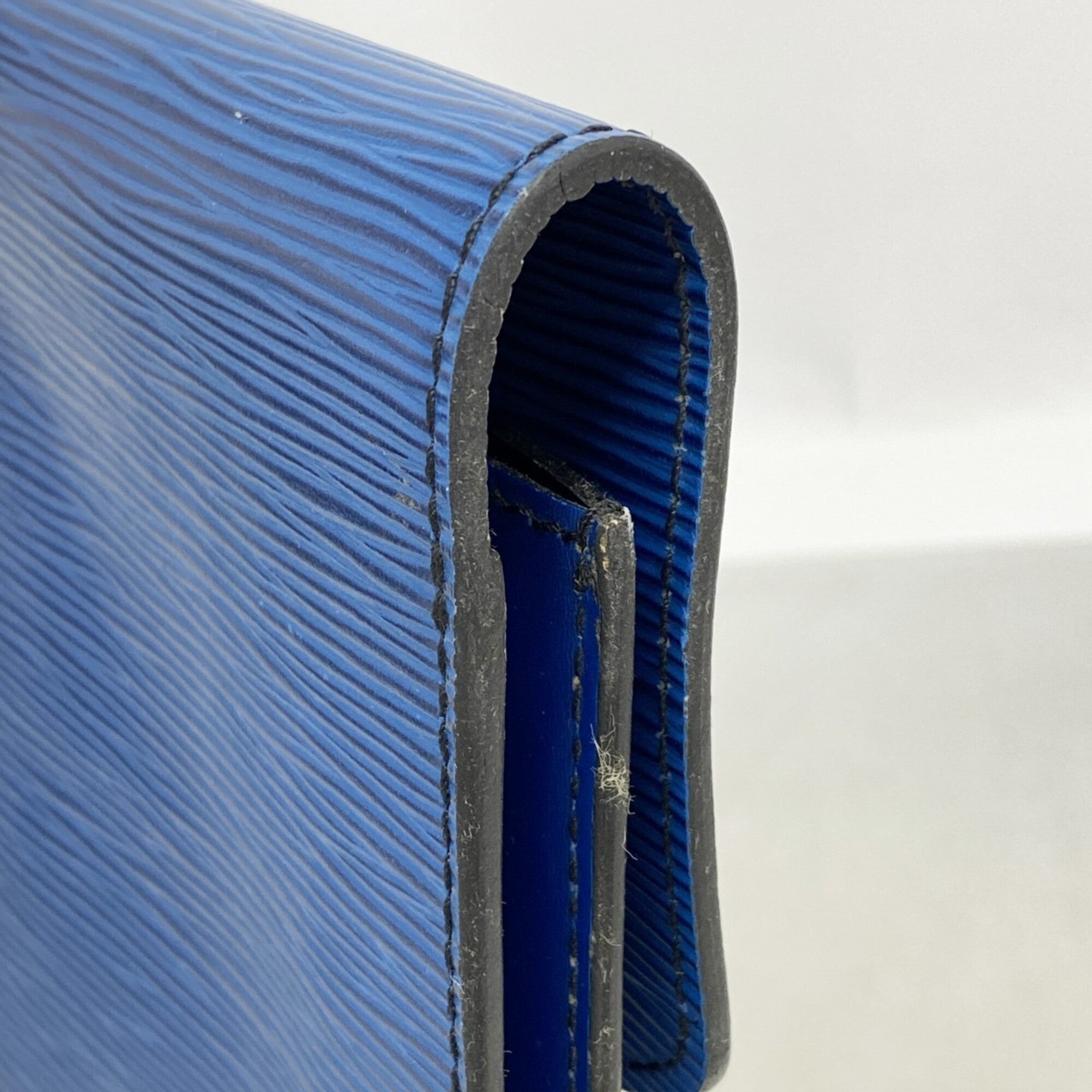 Louis Vuitton Toledo Blue Clutch Bag (Pre-Owned)