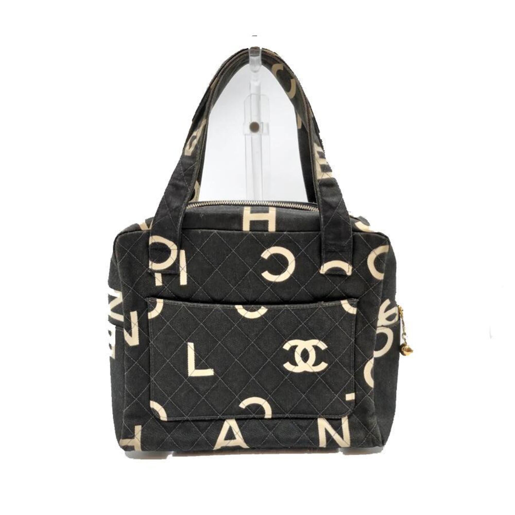 Chanel Black White Canvas Handbag (Pre-Owned)