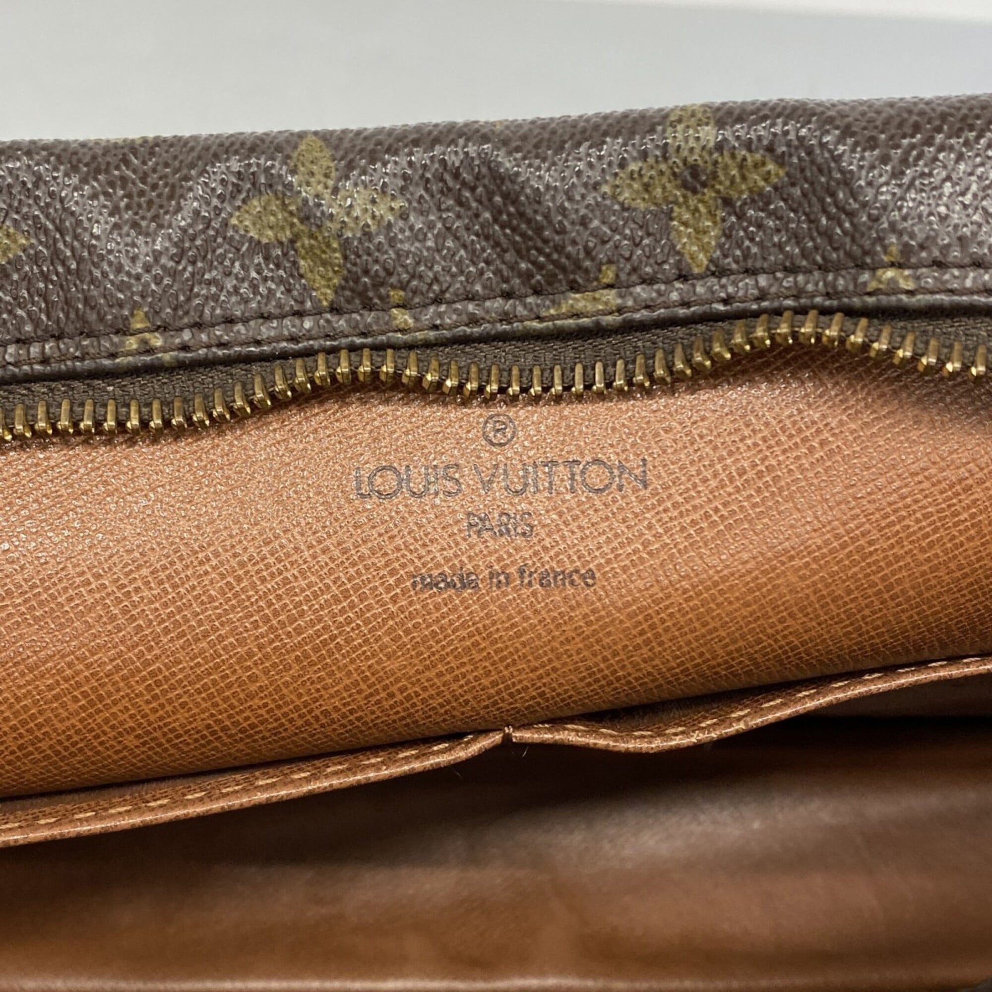 Louis Vuitton Brown Clutch Bag (Pre-Owned)