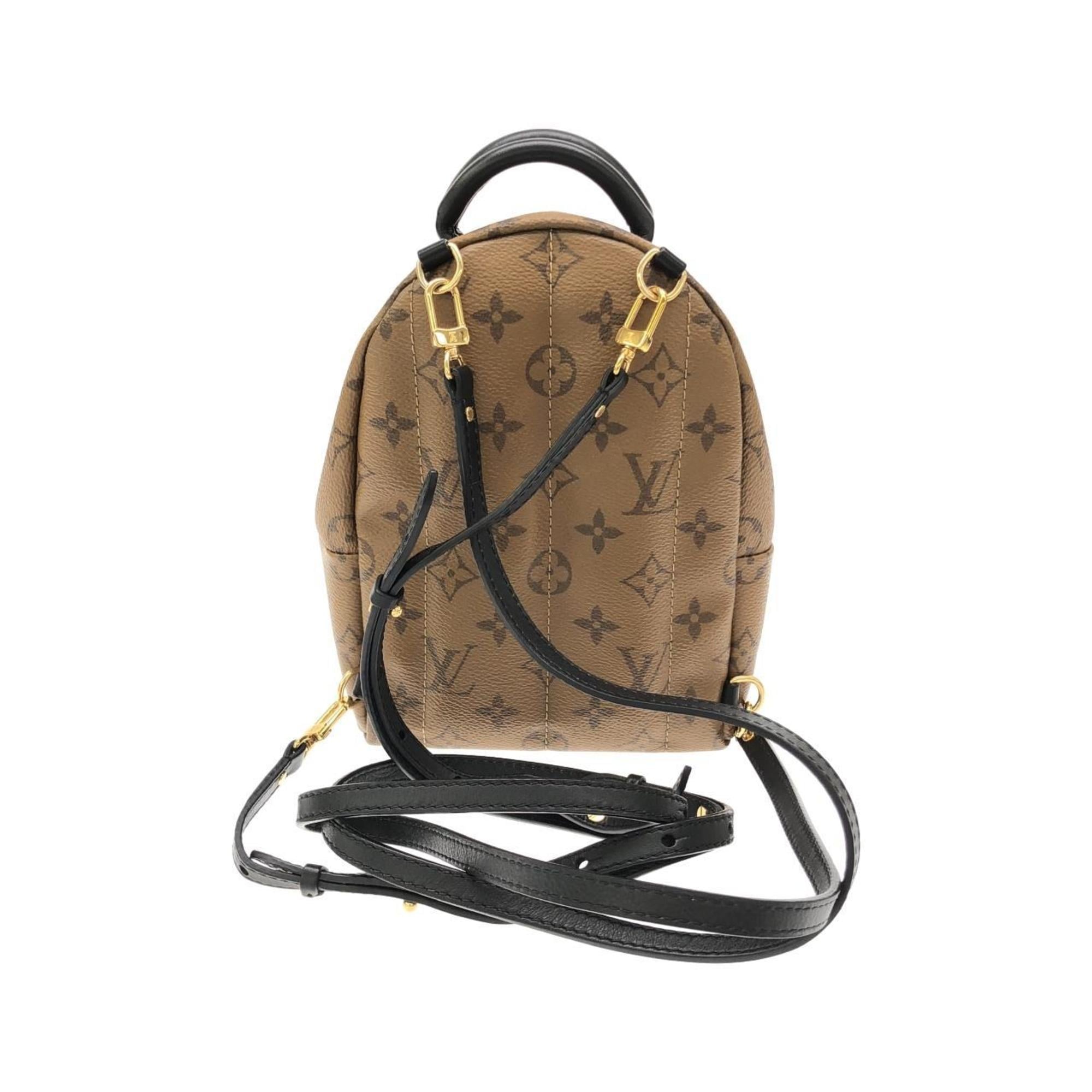 Louis Vuitton Brown Coated Canvas Backpack (Pre-Owned)