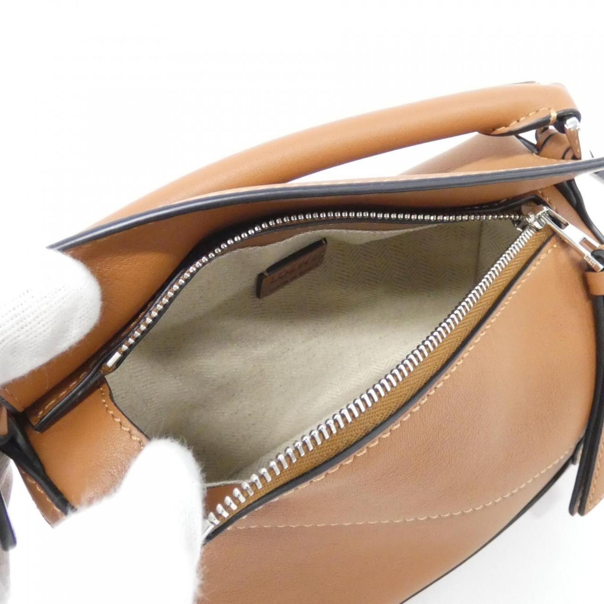 Loewe Puzzle Silver Leather Handbag (Pre-Owned)