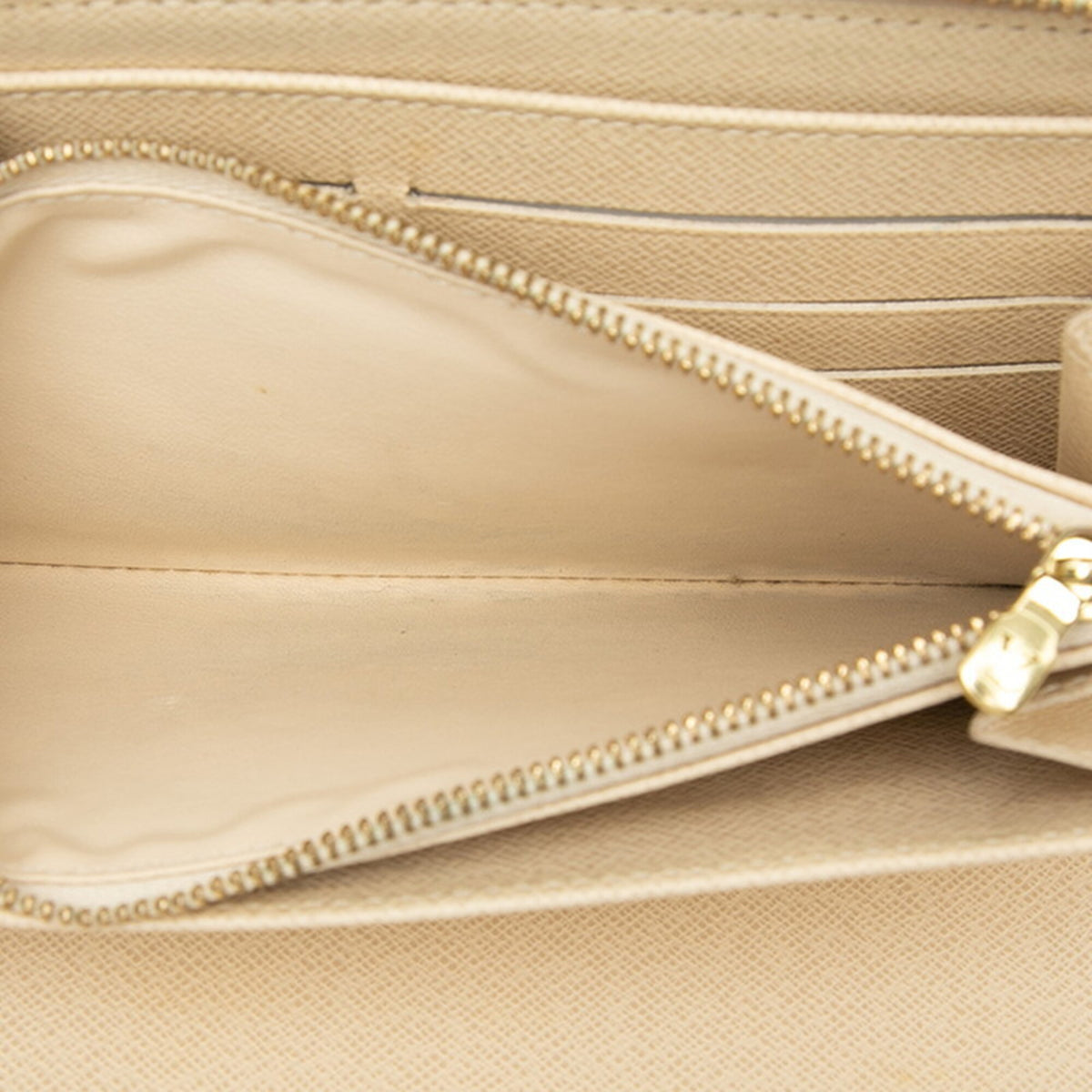 Louis Vuitton White Pvc Leather Long Wallet (Bi-Fold) (Pre-Owned)