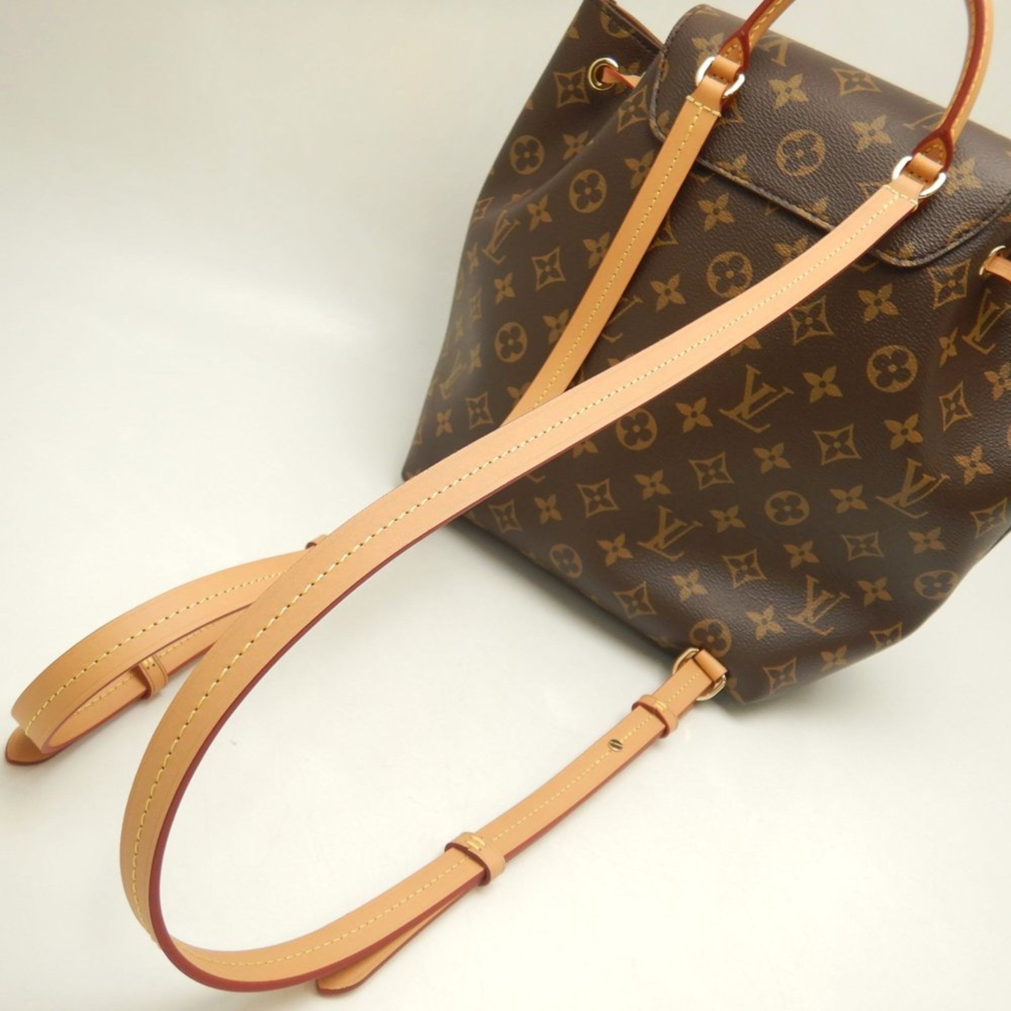 Louis Vuitton Brown Monogram Monogram Pvc Backpack (Pre-Owned)