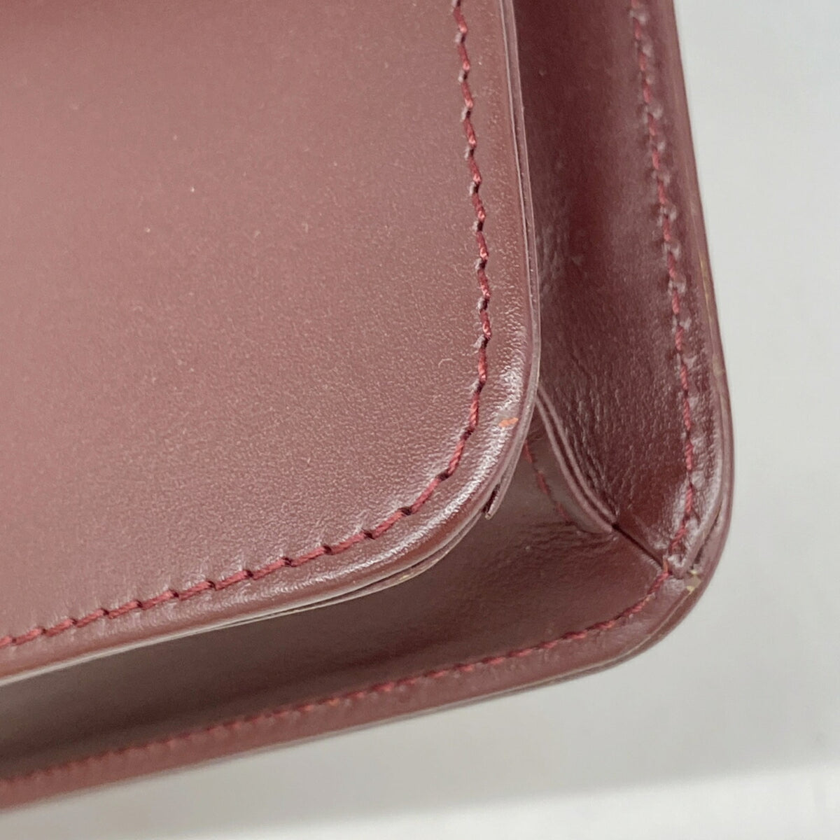 Cartier Bordeaux Leather Clutch Bag (Pre-Owned)