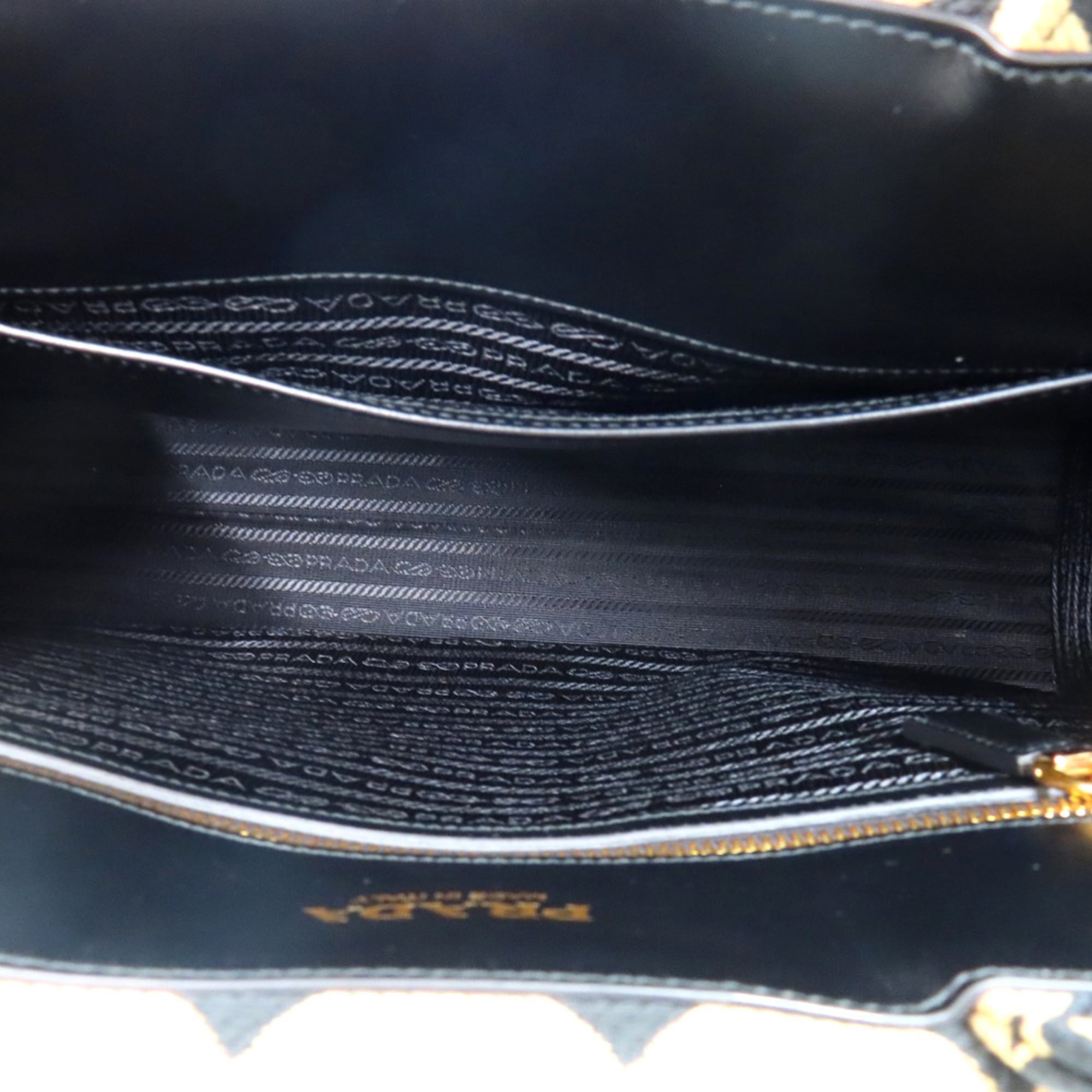 Prada Beige Black Fabric Leather Handbag (Pre-Owned)