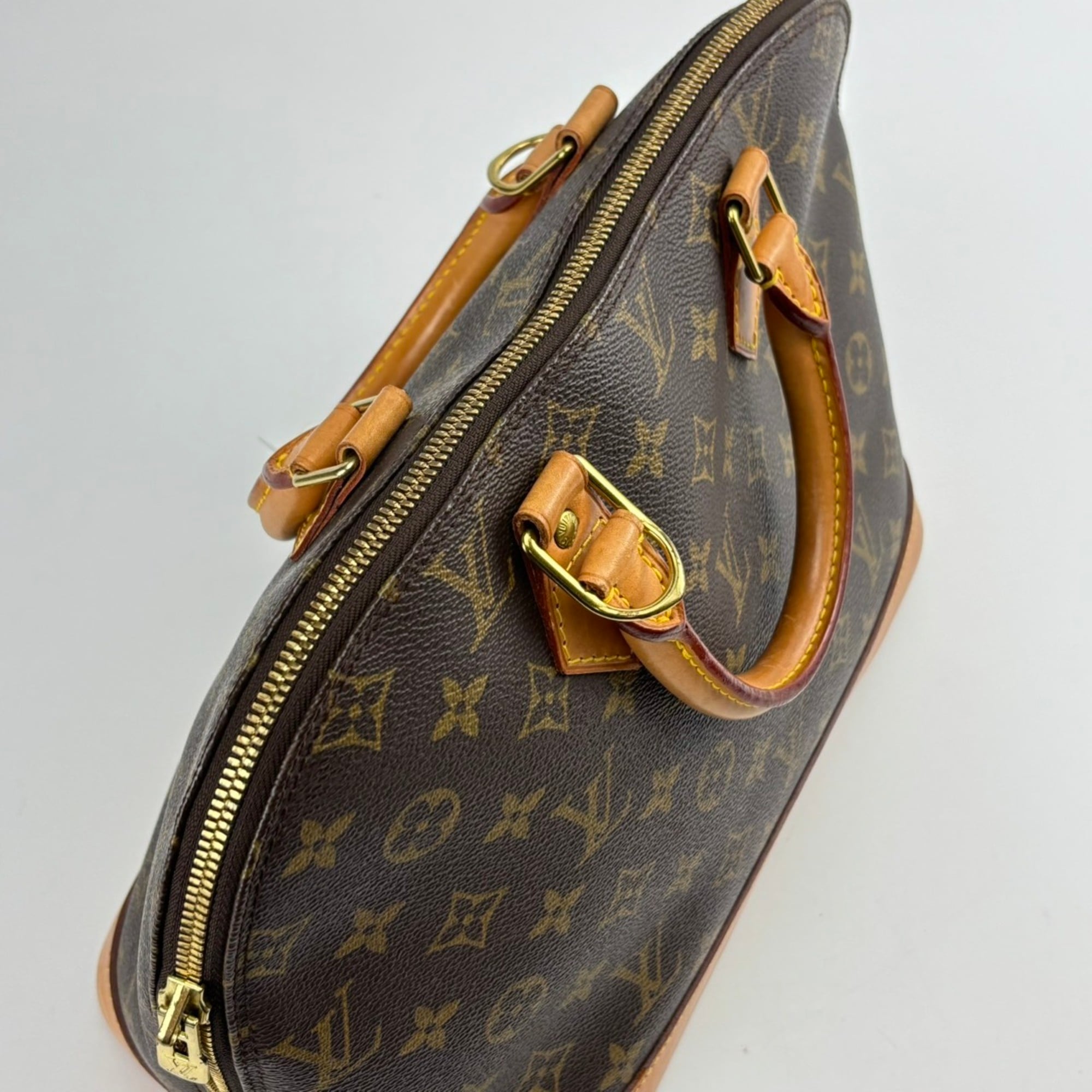 Louis Vuitton Brown Monogram Leather Handbag (Pre-Owned)