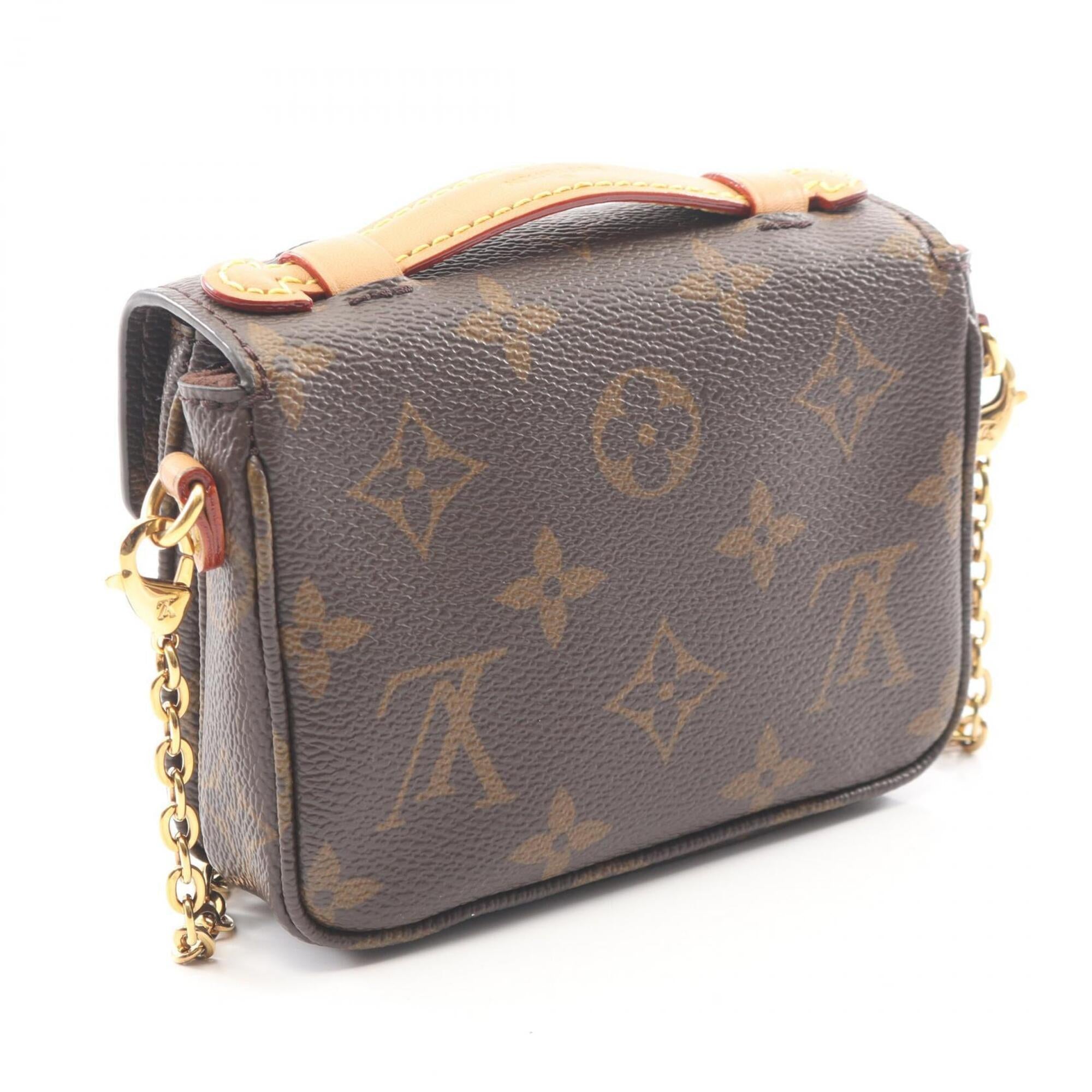 Louis Vuitton Brown Pvc Leather Handbag (Pre-Owned)