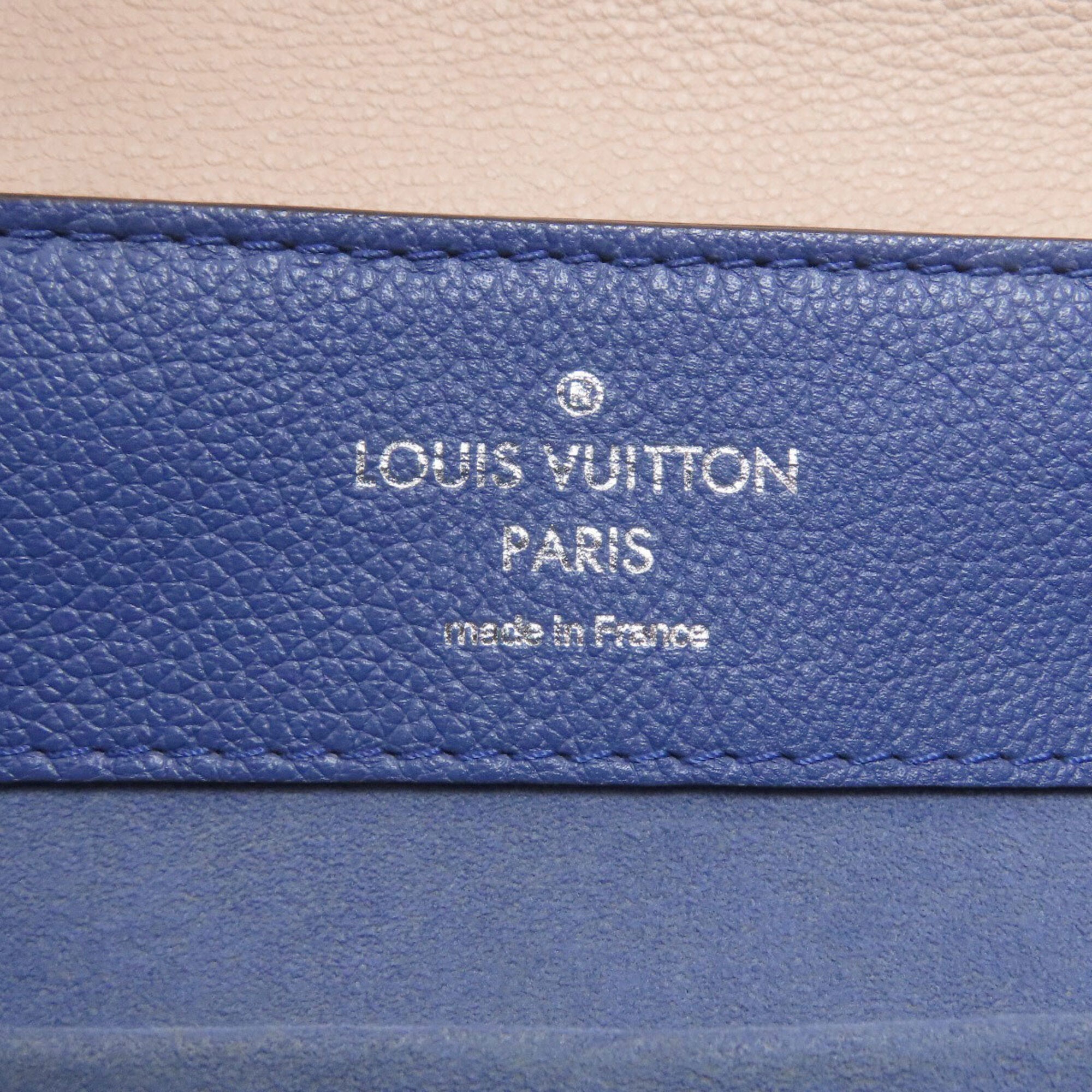 Louis Vuitton Beige Blue Leather Backpack (Pre-Owned)