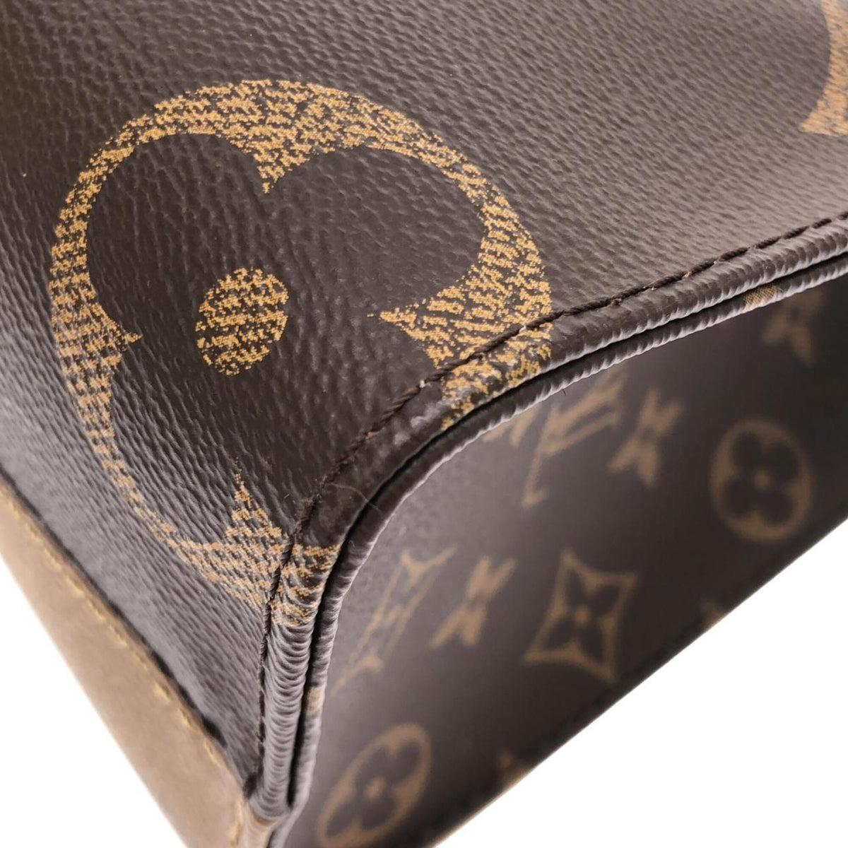 Louis Vuitton Brown Coated Canvas Handbag (Pre-Owned)