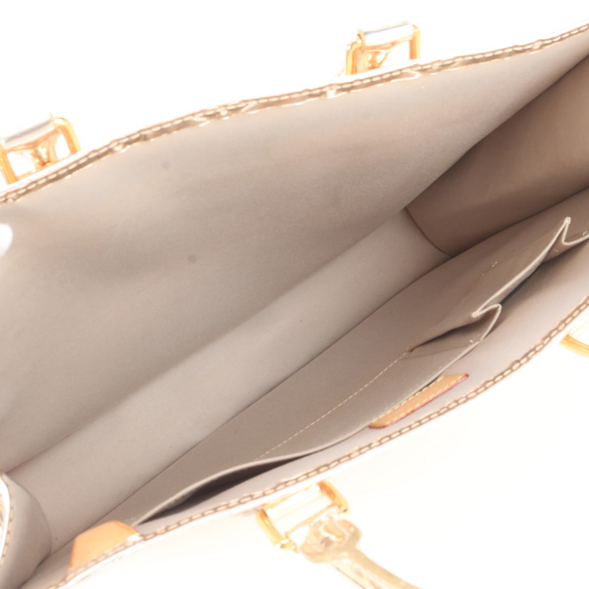 Louis Vuitton Gold Leather Handbag Tote Bag (Pre-Owned)