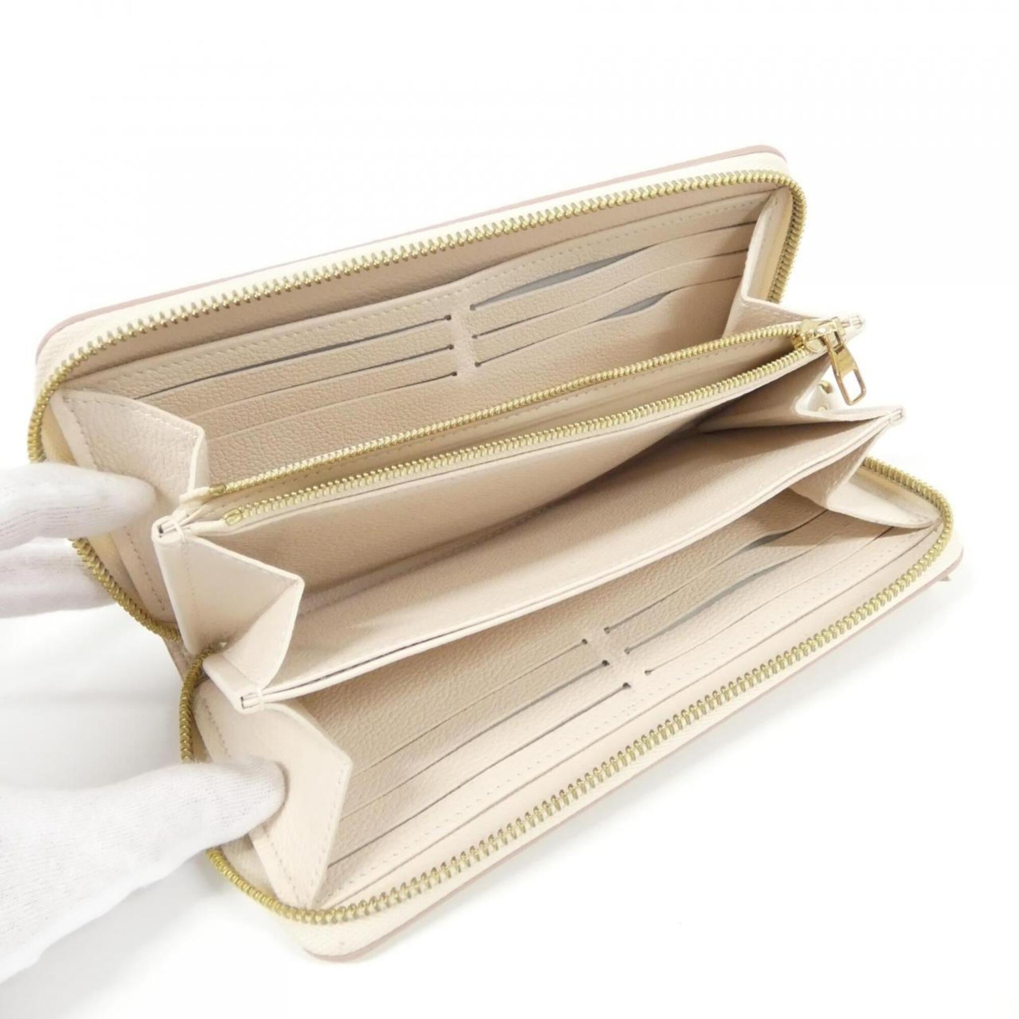 Louis Vuitton Monogram Empreinte Bicolor White Monogram Empreinte Long Wallet (Bi-Fold) (Pre-Owned)