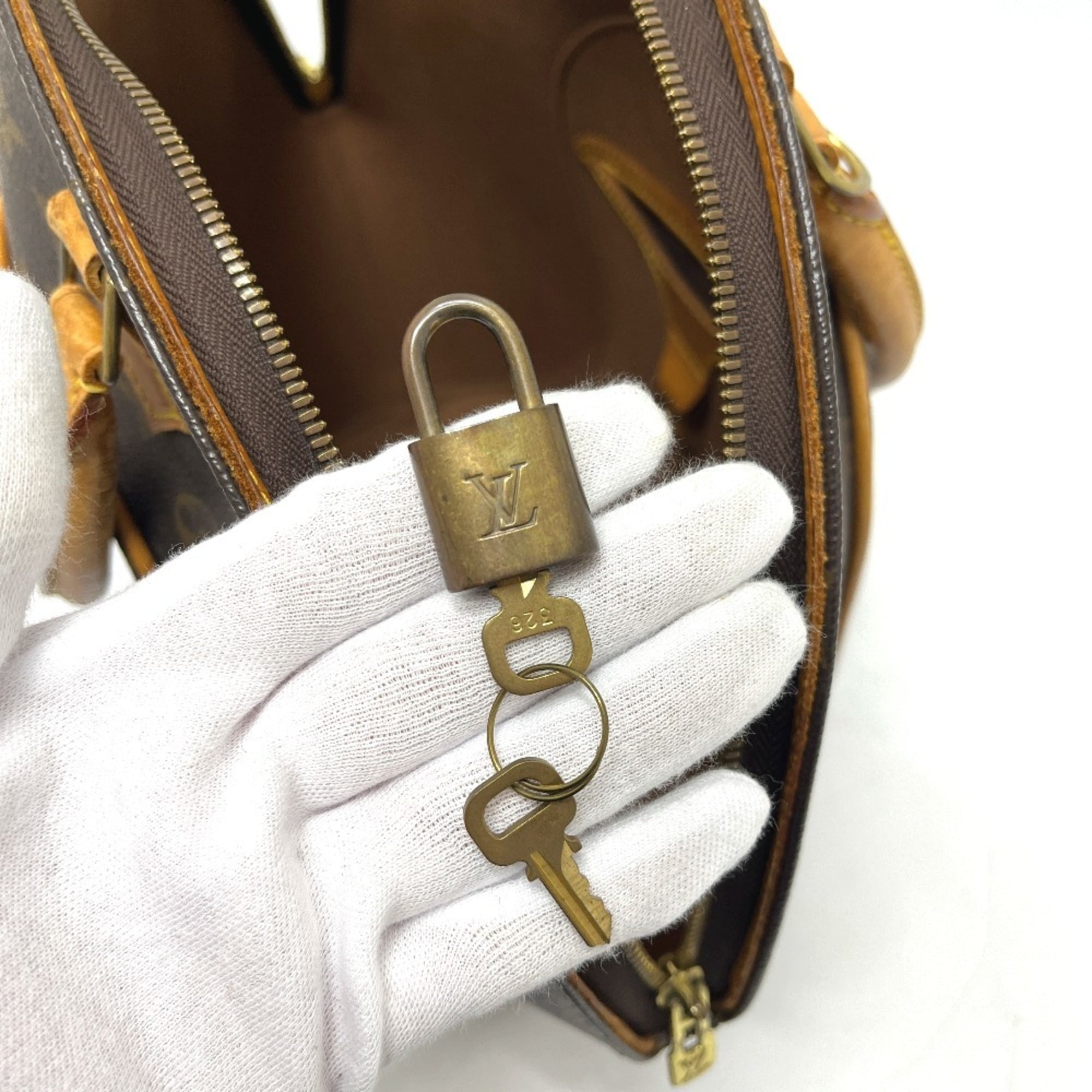 Louis Vuitton Brown Monogram Canvas Handbag (Pre-Owned)