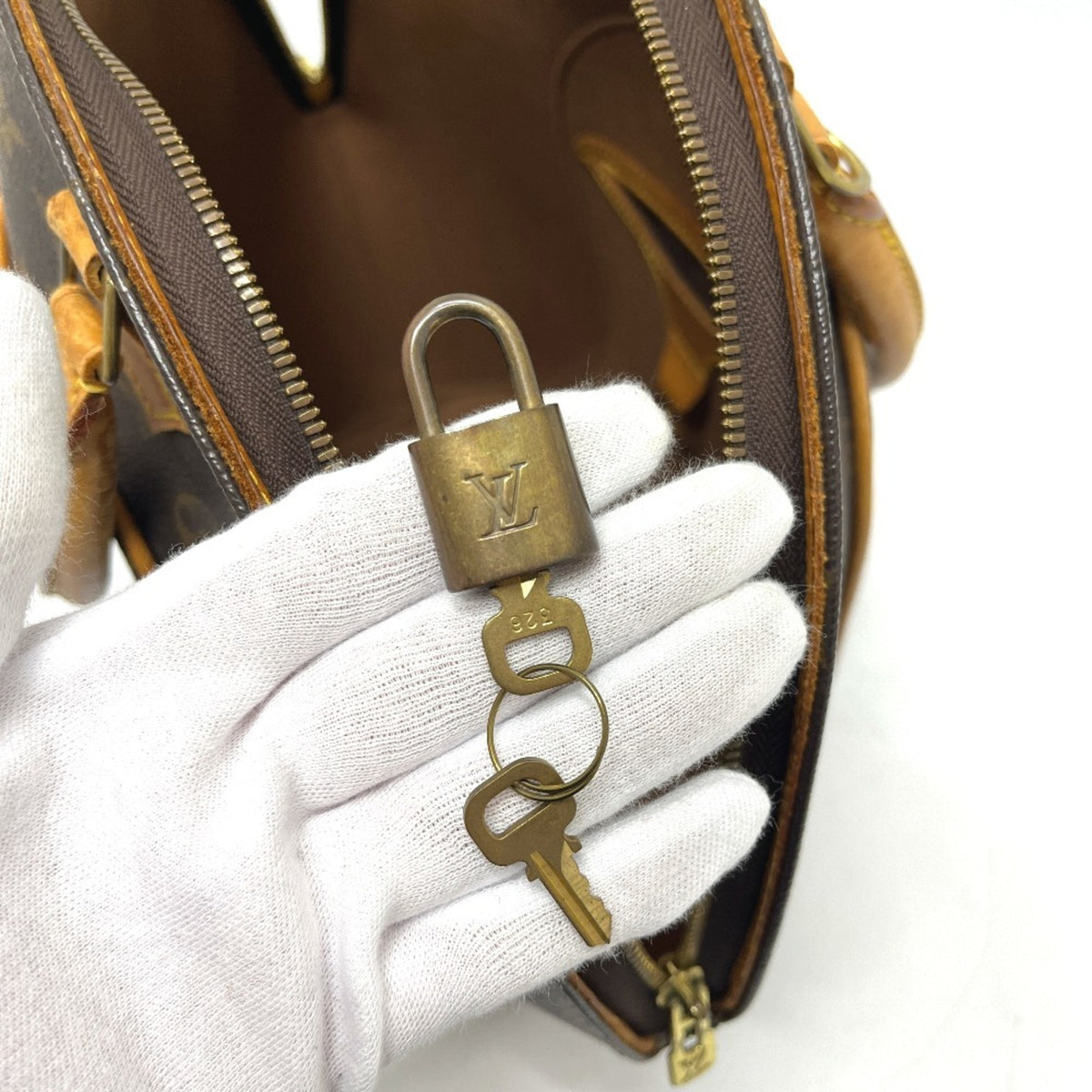 Louis Vuitton Brown Monogram Canvas Handbag (Pre-Owned)