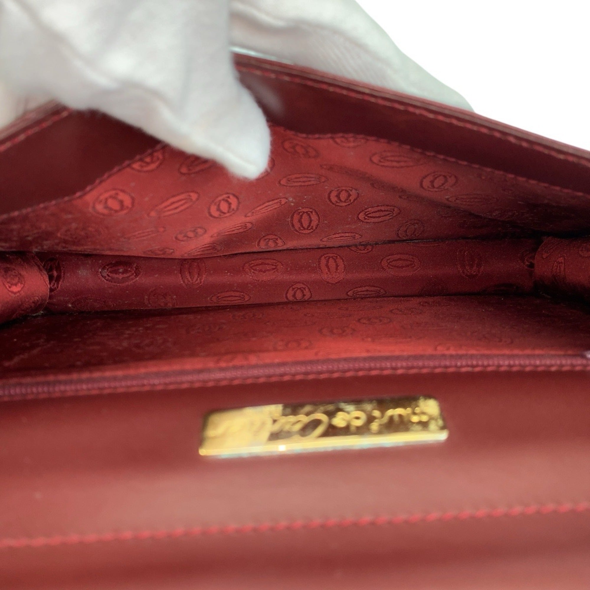 Cartier Bordeaux Leather Clutch Bag (Pre-Owned)