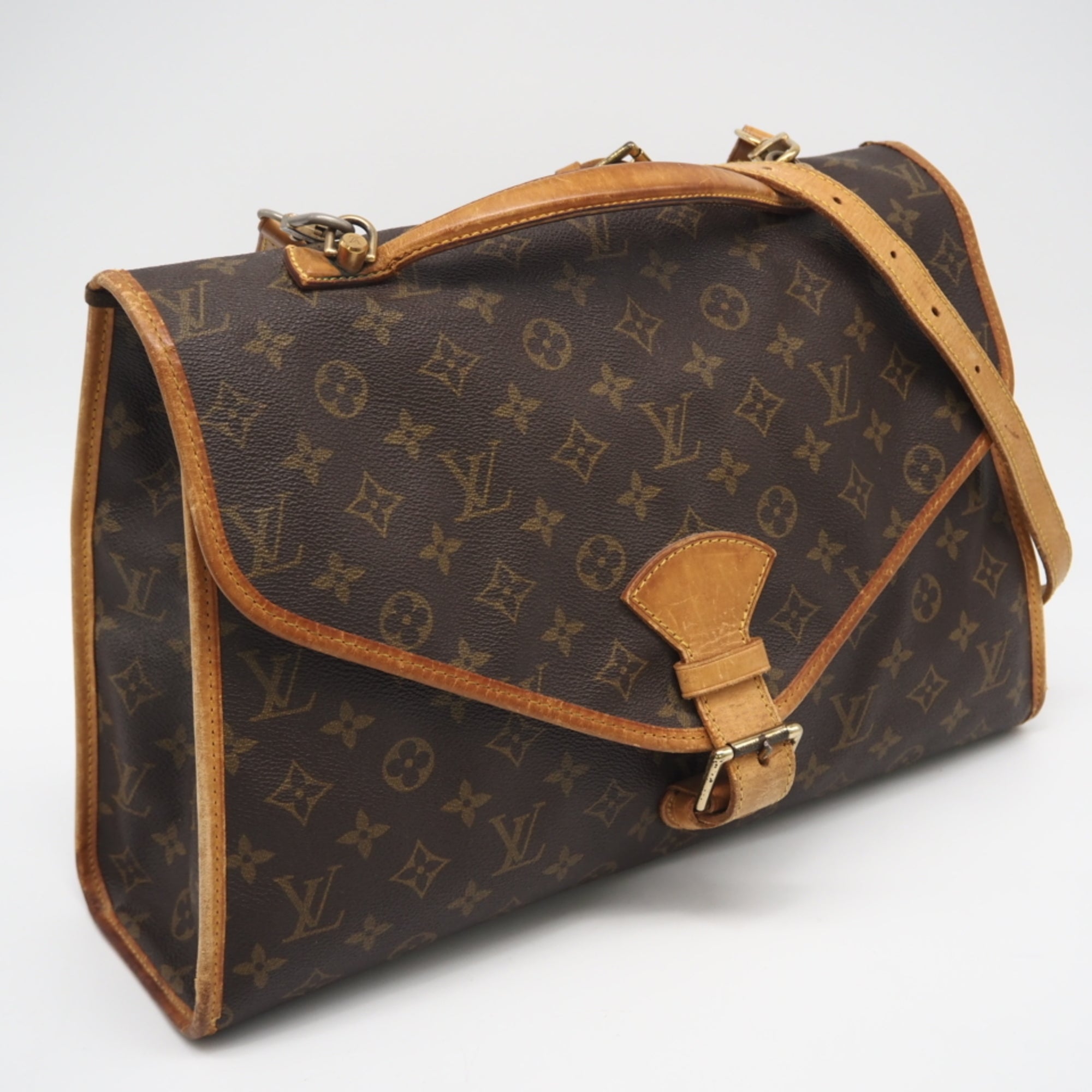 Louis Vuitton Brown Coated Canvas Leather Handbag (Pre-Owned)
