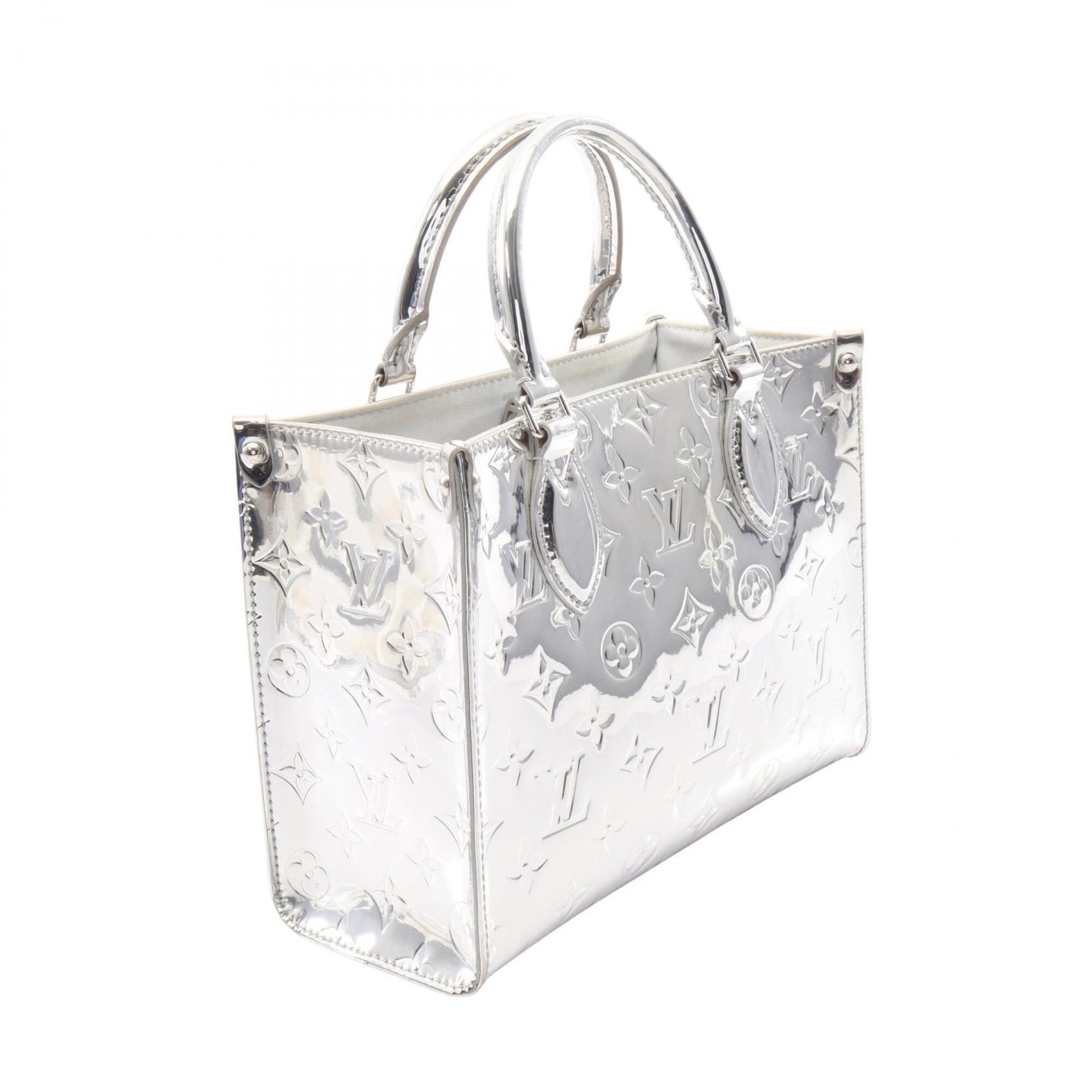 Louis Vuitton Argent Silver Coated Canvas Handbag (Pre-Owned)