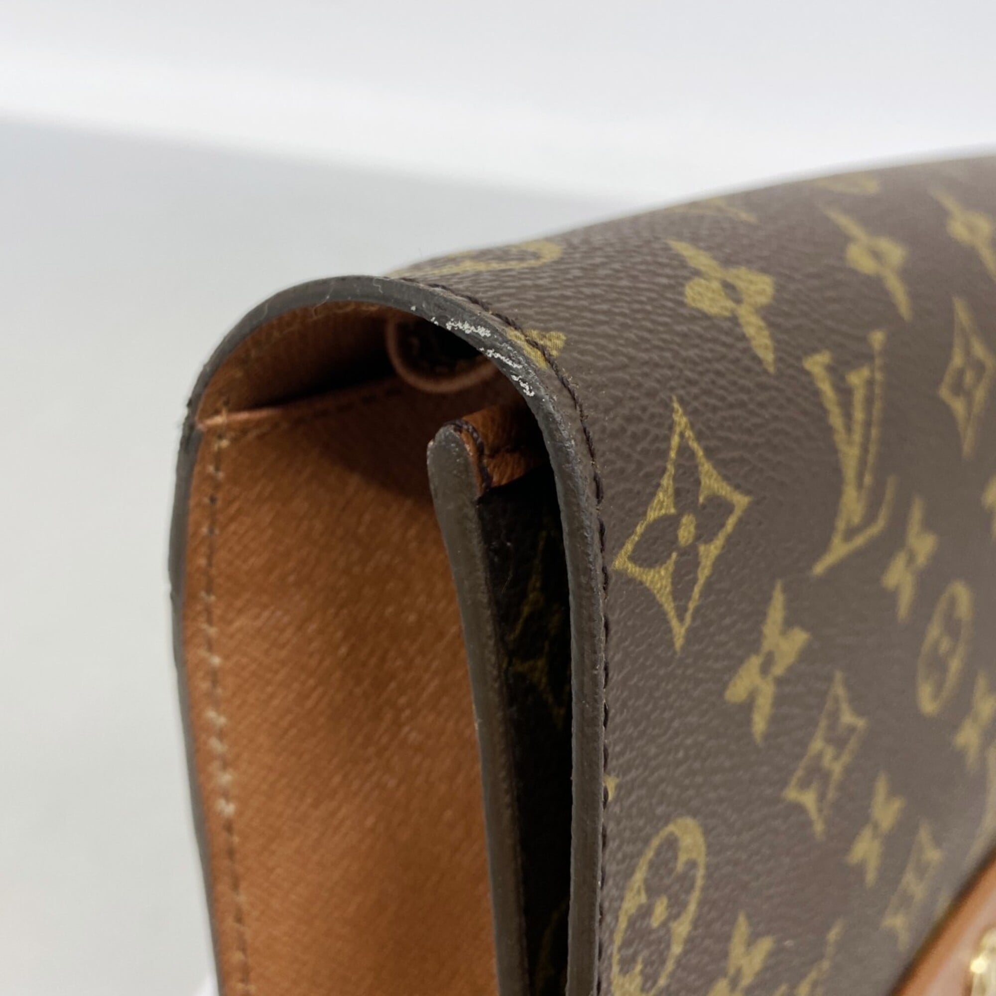 Louis Vuitton Brown Clutch Bag (Pre-Owned)