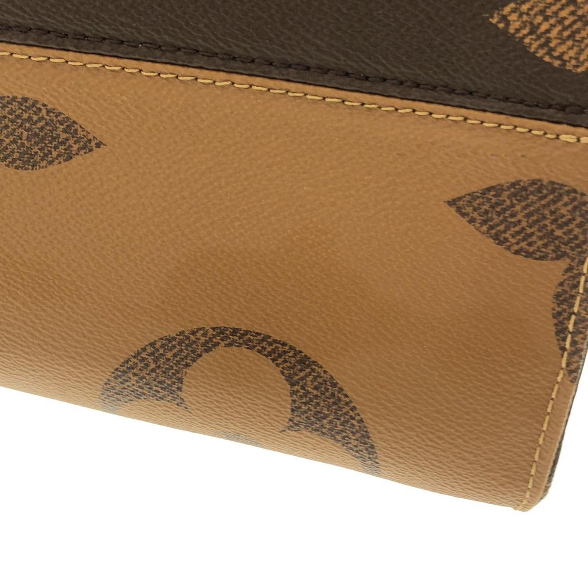 Louis Vuitton Brown Coated Canvas Handbag (Pre-Owned)
