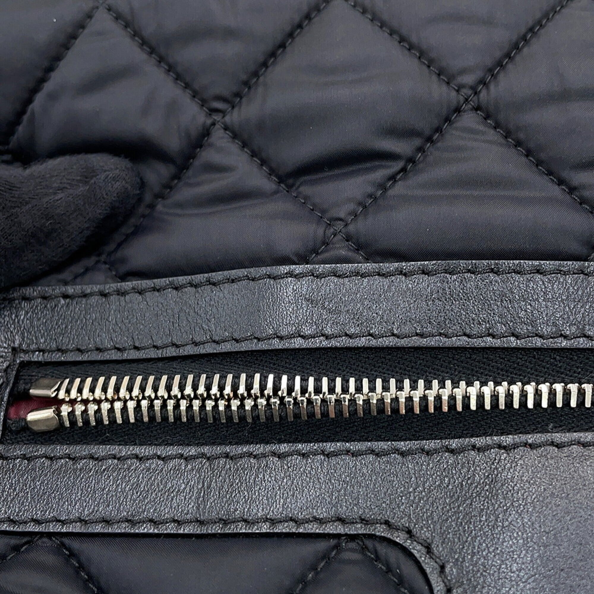 Chanel Black Nylon Leather Backpack Handbag (Pre-Owned)
