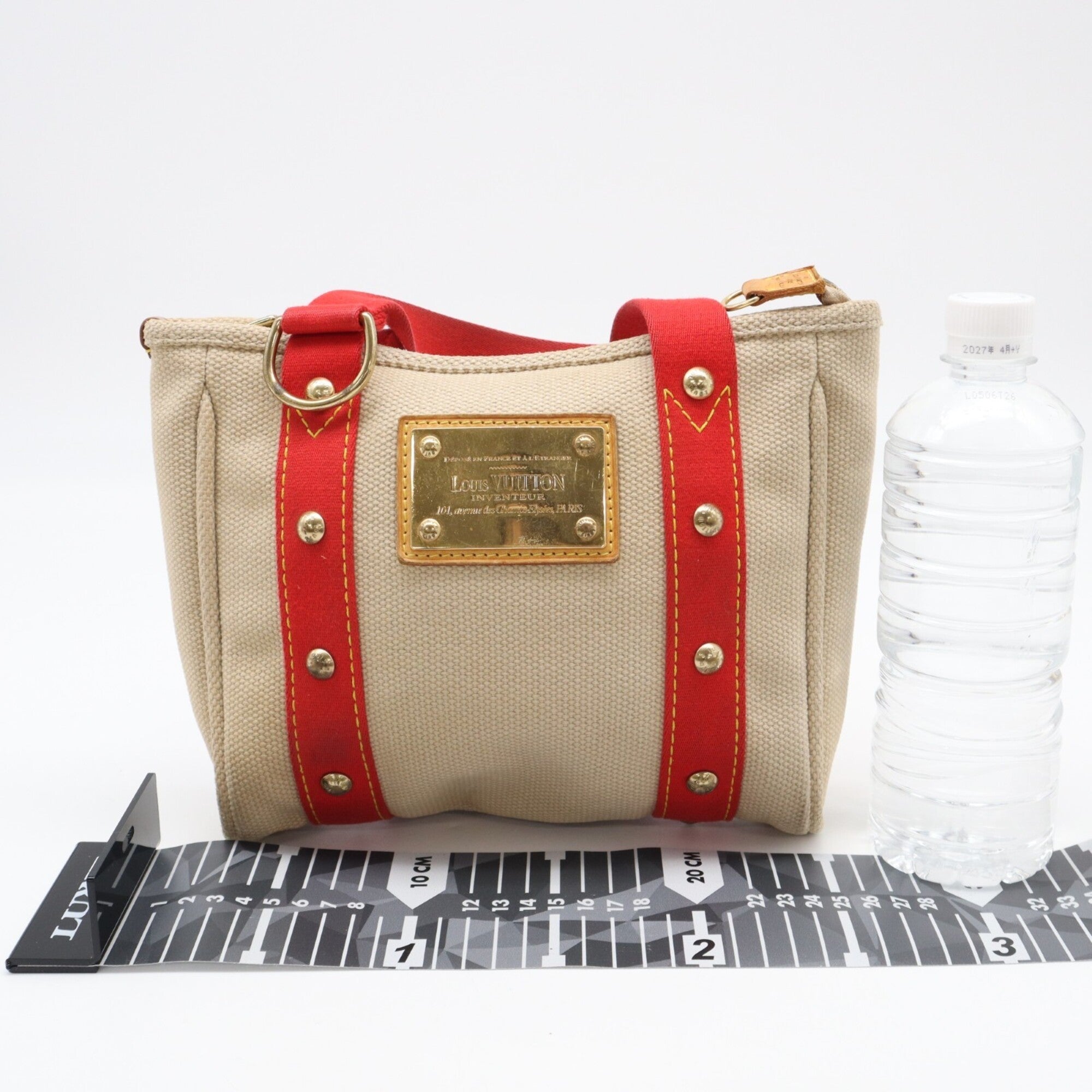 Louis Vuitton Beige Red Color Canvas Handbag (Pre-Owned)