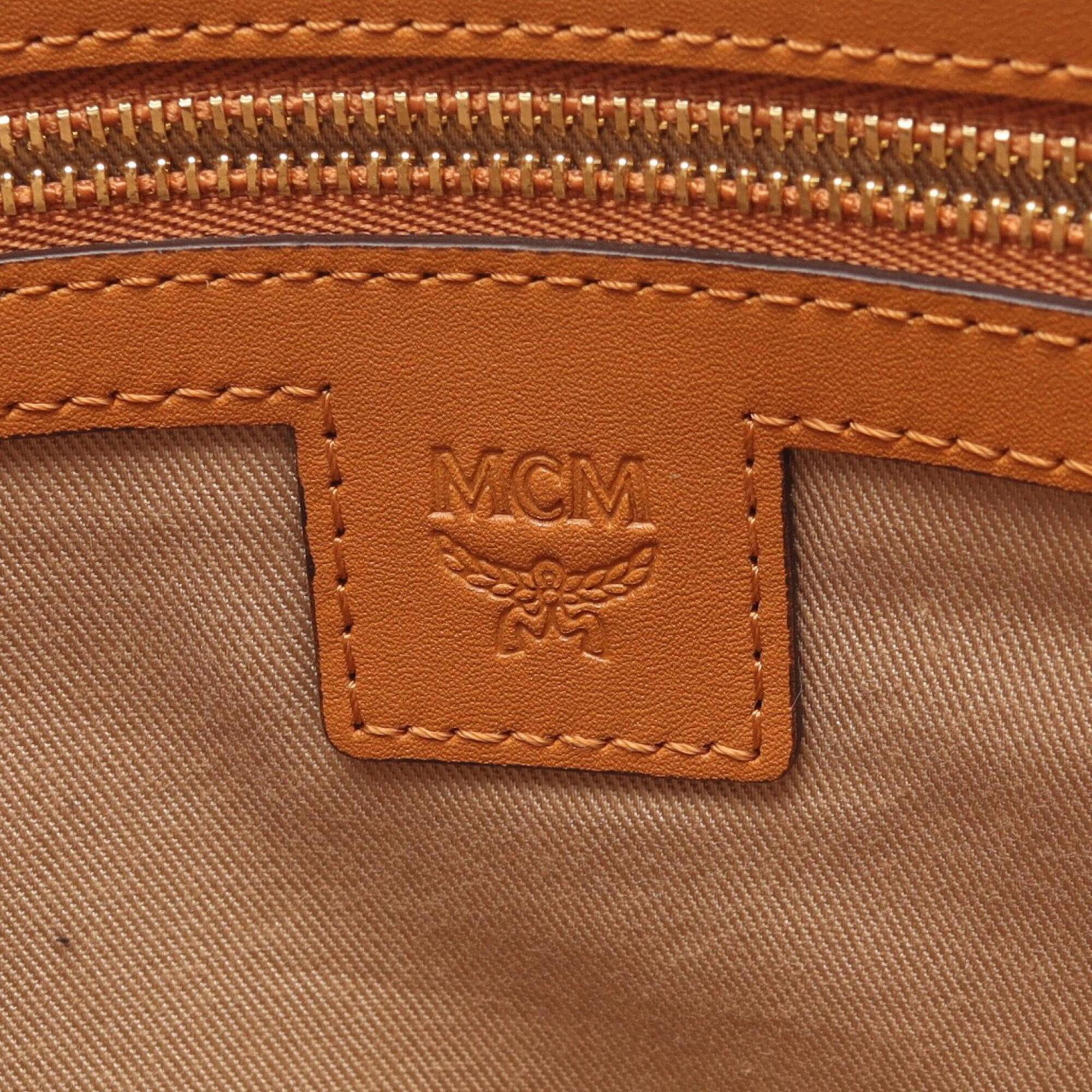Mcm Brown Coated Canvas Leather Clutch Bag Handbag (Pre-Owned)