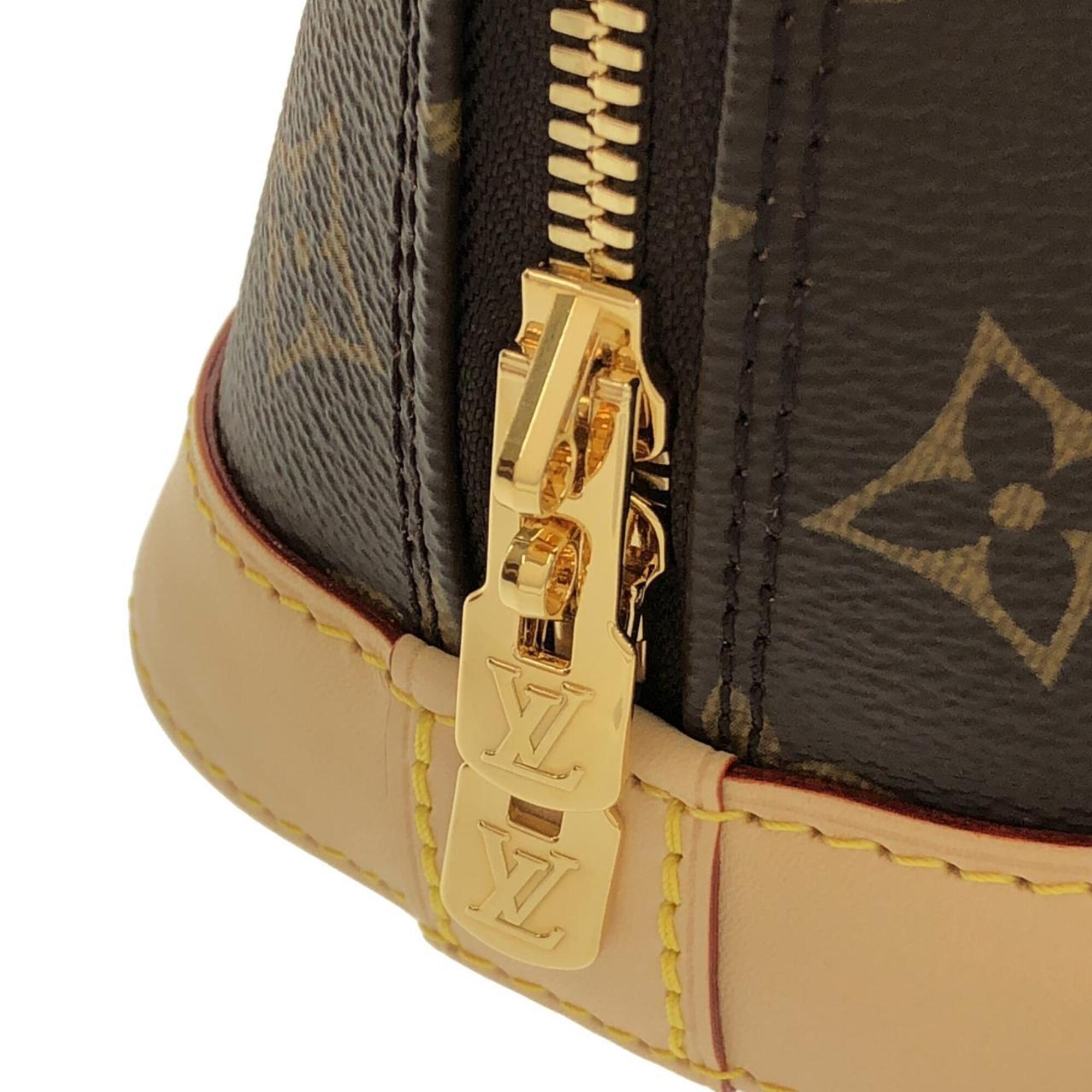 Louis Vuitton Brown Coated Canvas Handbag (Pre-Owned)