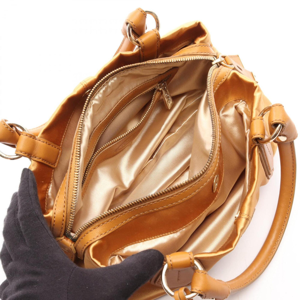 Tod's Brown Fabric Leather Handbag (Pre-Owned)