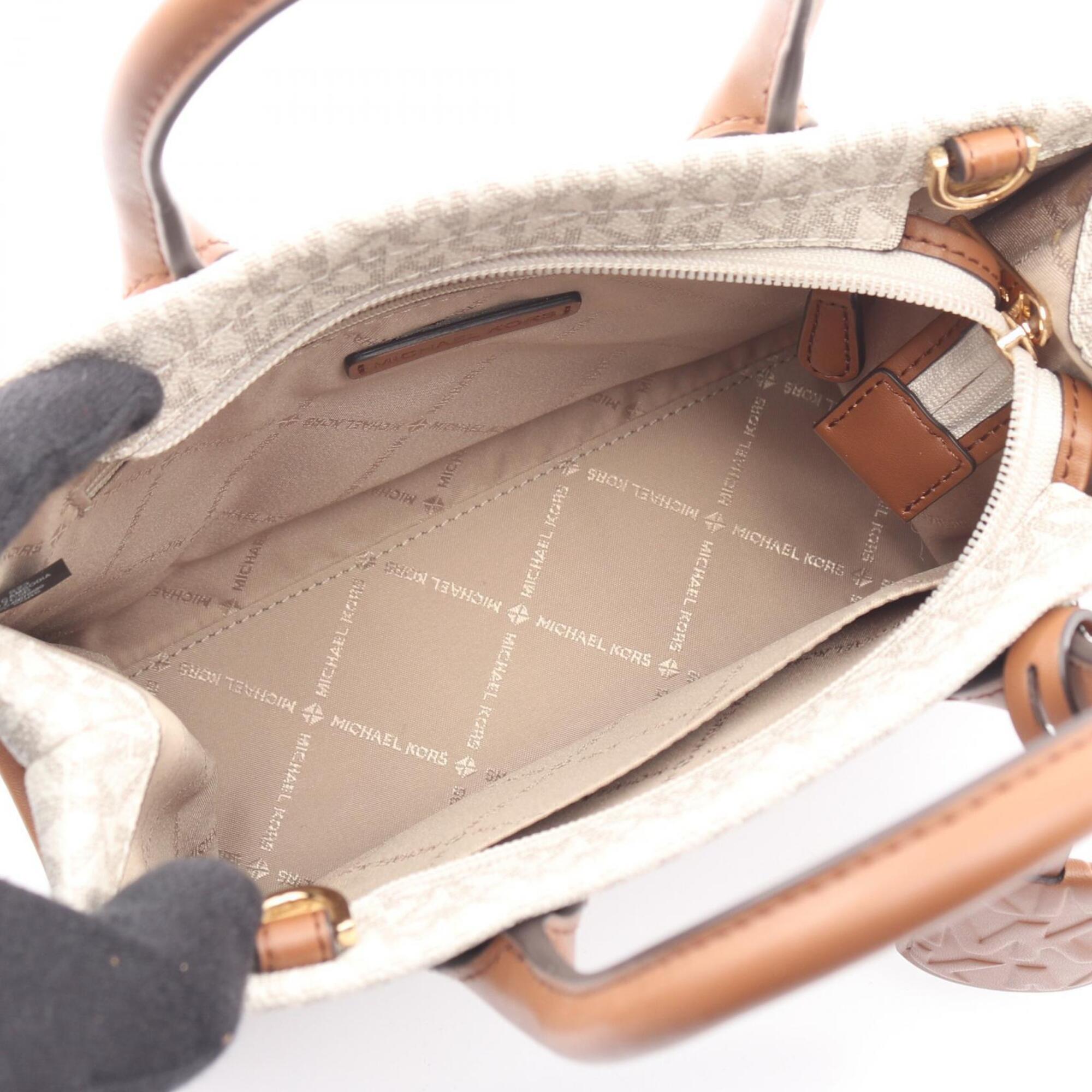 Michael Kors Brown White Leather Pvc Coated Canvas Handbag (Pre-Owned)
