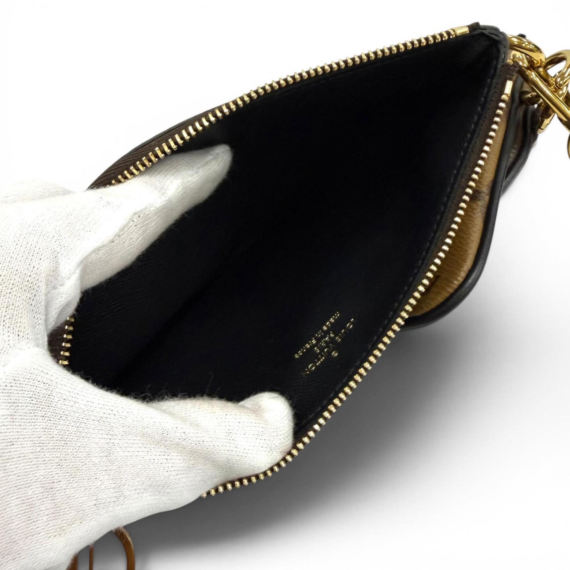 Louis Vuitton Brown Leather Pochette (Pre-Owned)