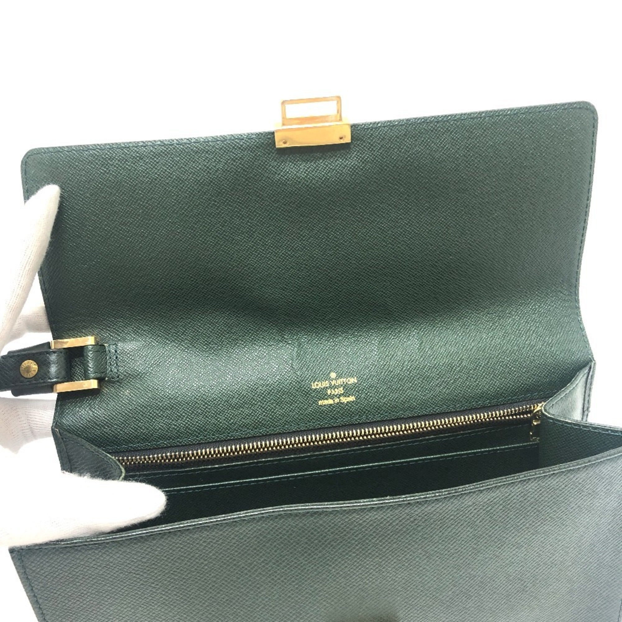 Louis Vuitton Episea Leather Taiga Leather Clutch Bag (Pre-Owned)