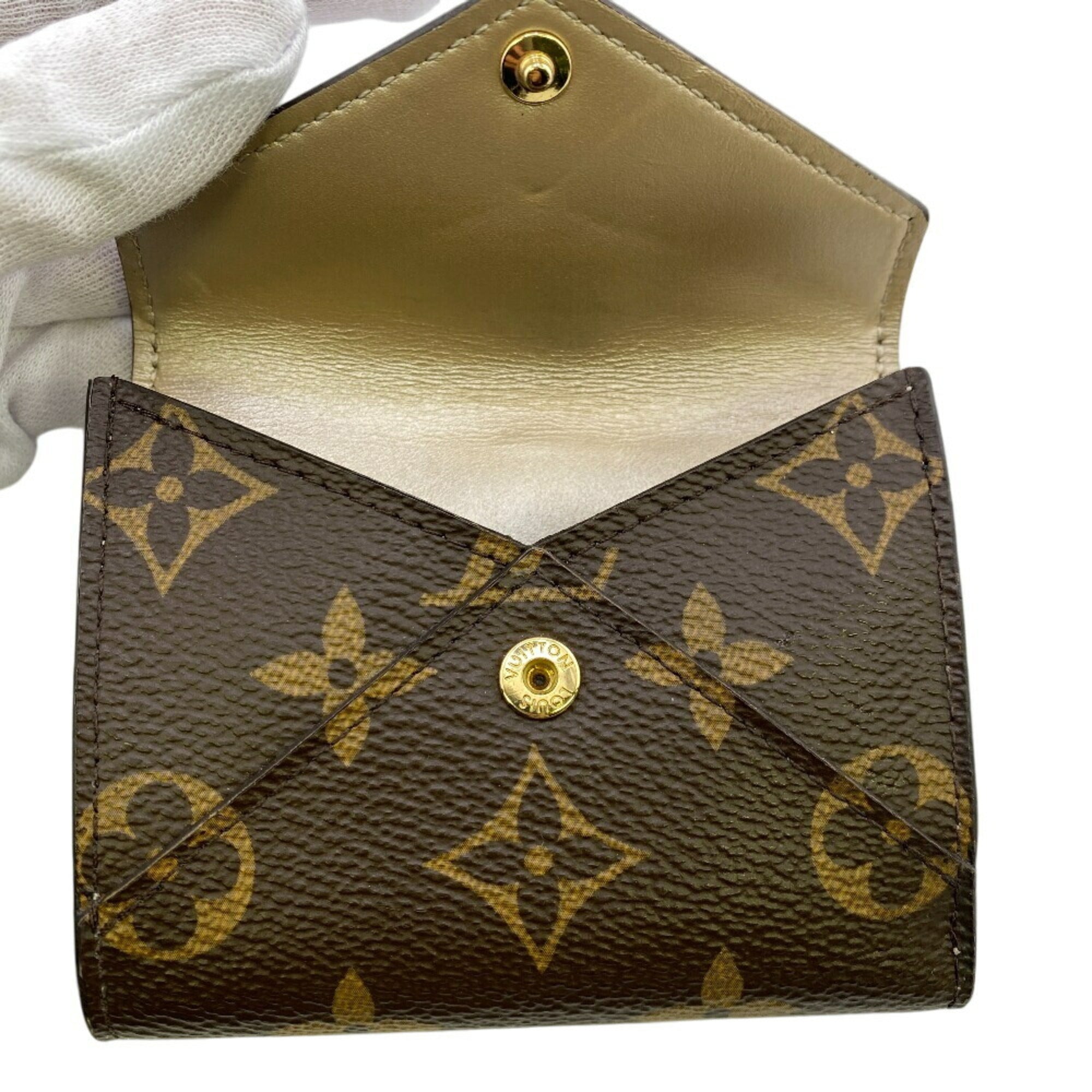 Louis Vuitton Brown Leather Wallet (Tri-Fold) (Pre-Owned)