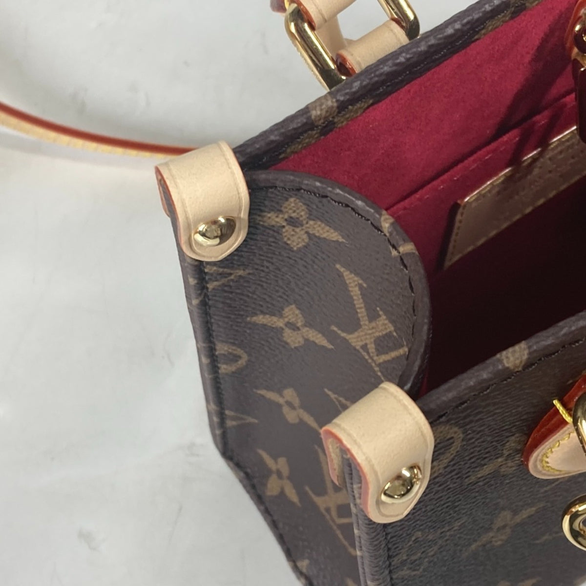 Louis Vuitton Brown Monogram Canvas Handbag (Pre-Owned)