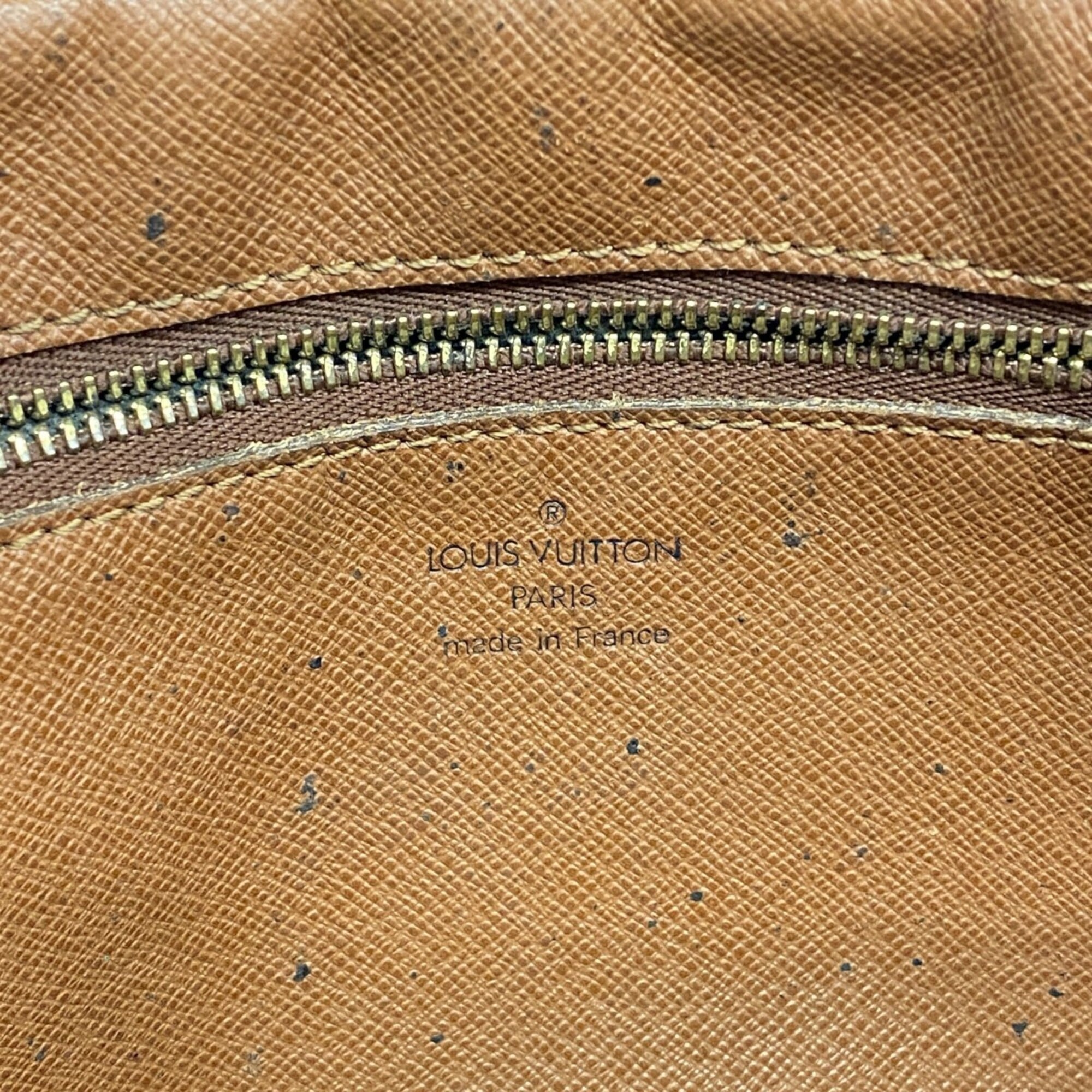 Louis Vuitton Brown Clutch Bag (Pre-Owned)