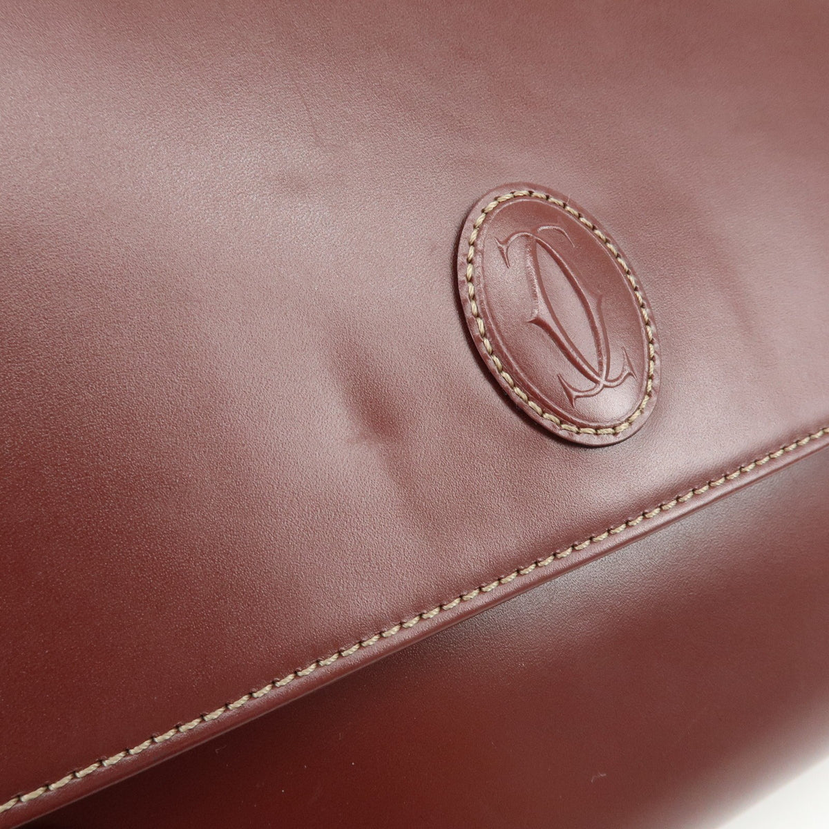 Cartier Must De Cartier Clutch Leather Burgundy Leather Clutche & Pouche Bag (Pre-Owned)