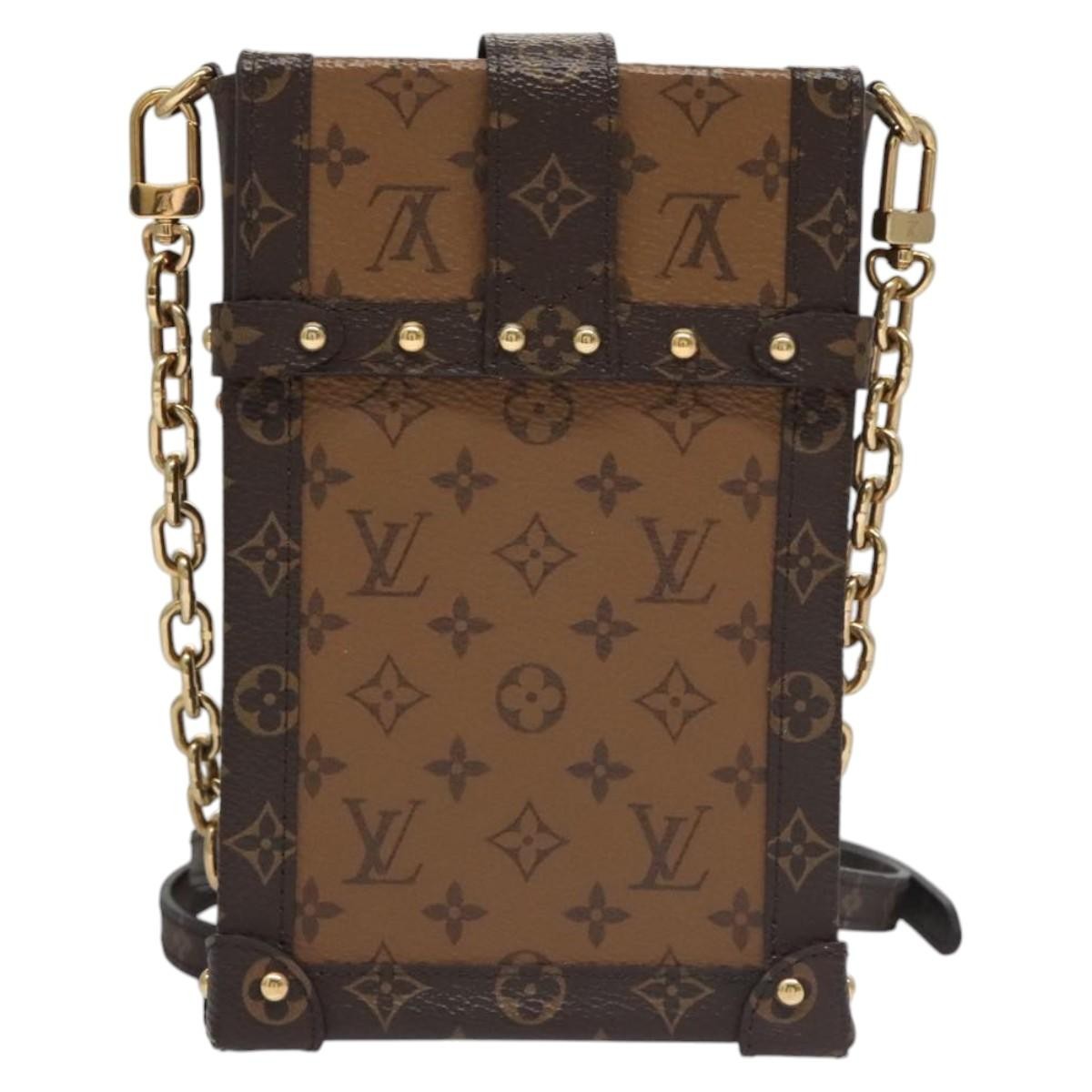 Louis Vuitton Vertical Trunk Pochette Reverse Monogram Canvas Brown Canvas Clutche & Pouche Bag (Pre-Owned)