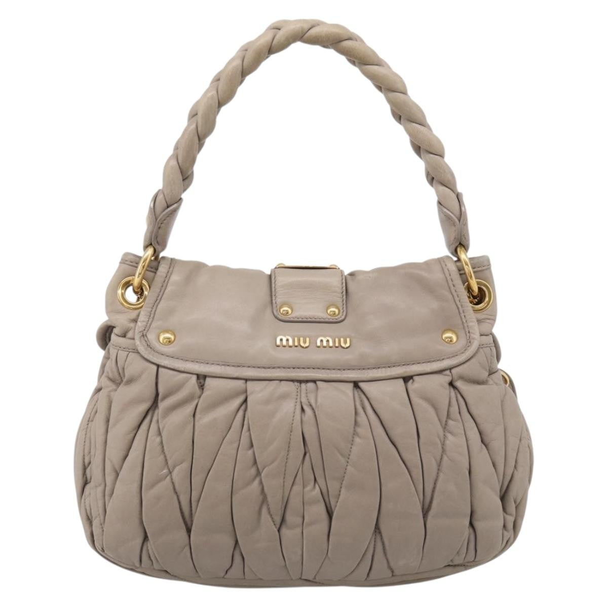 Miu Miu Coffer Hobo Matelasse Leather Beige Leather Handbag (Pre-Owned)