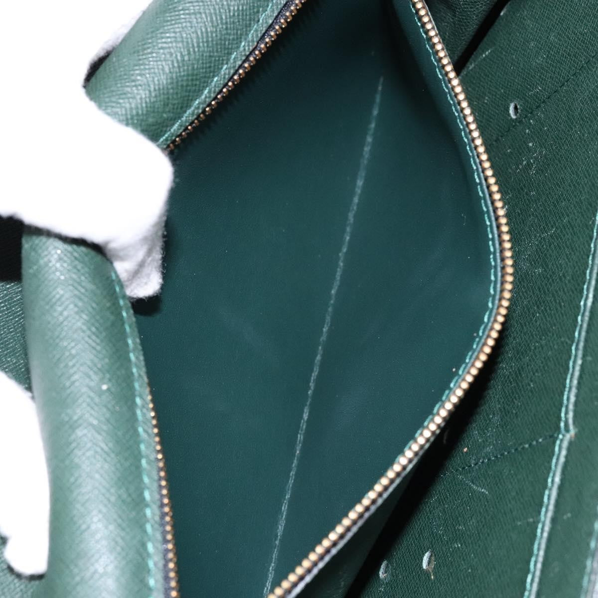 Louis Vuitton Serviette Kourad Taiga Leather Green Leather Clutche & Pouche Bag (Pre-Owned)