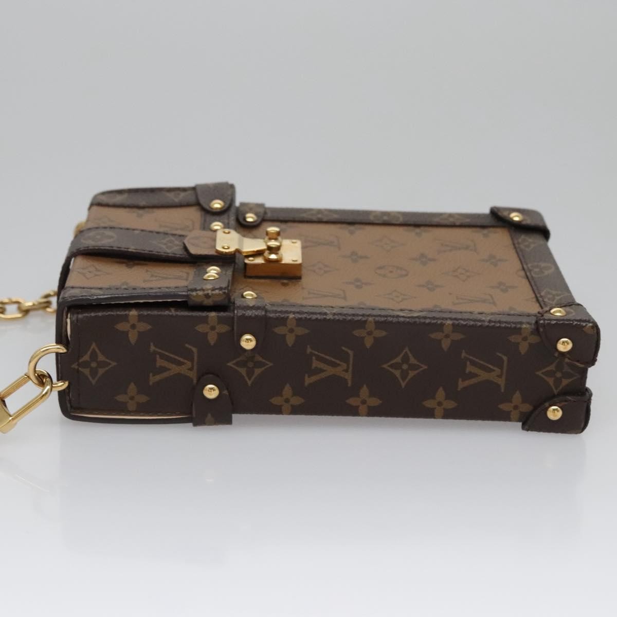 Louis Vuitton Vertical Trunk Pochette Reverse Monogram Canvas Brown Canvas Clutche & Pouche Bag (Pre-Owned)